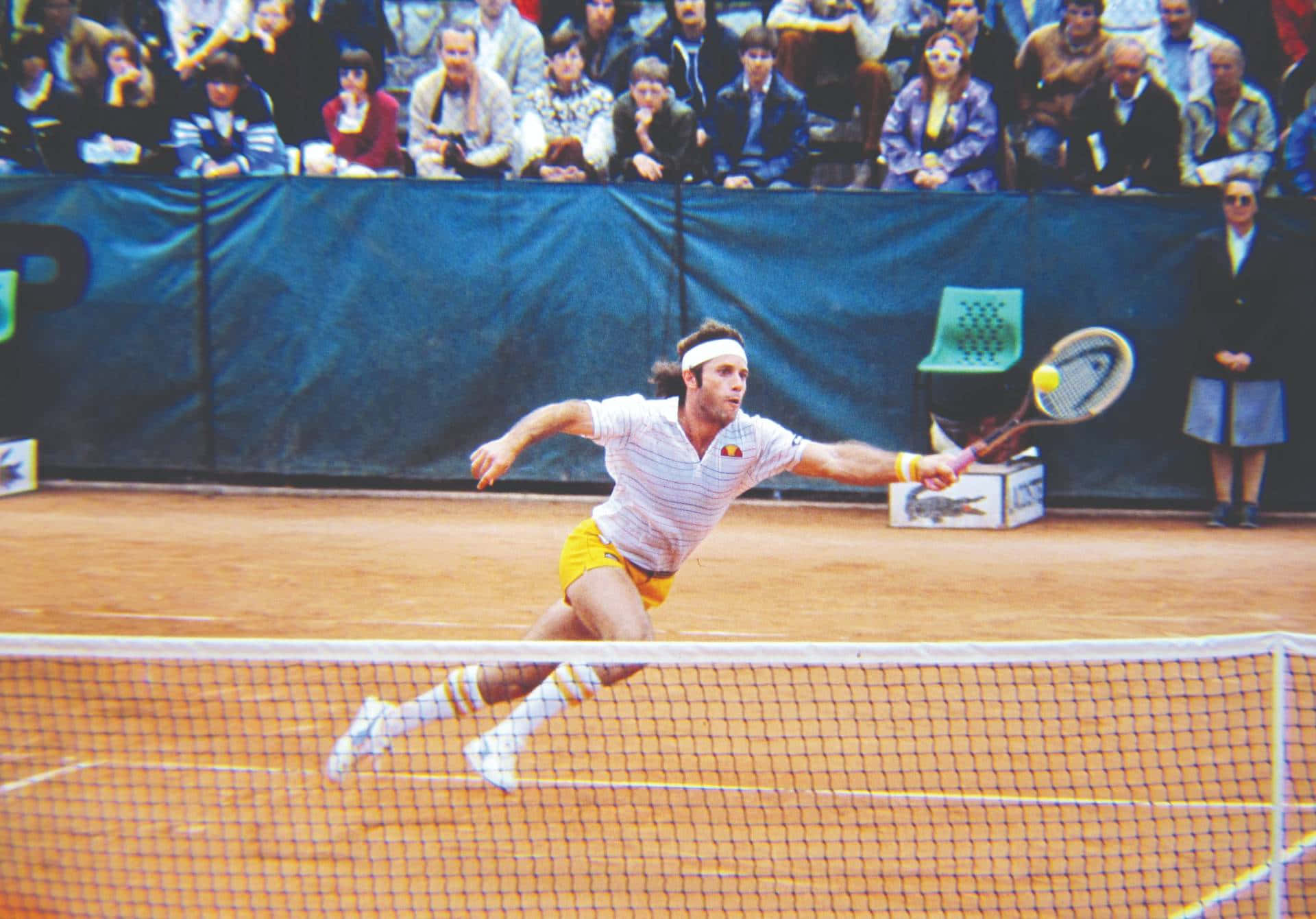 Argentine Tennis Legend Guillermo Vilas In Action During 1978 French Open Background