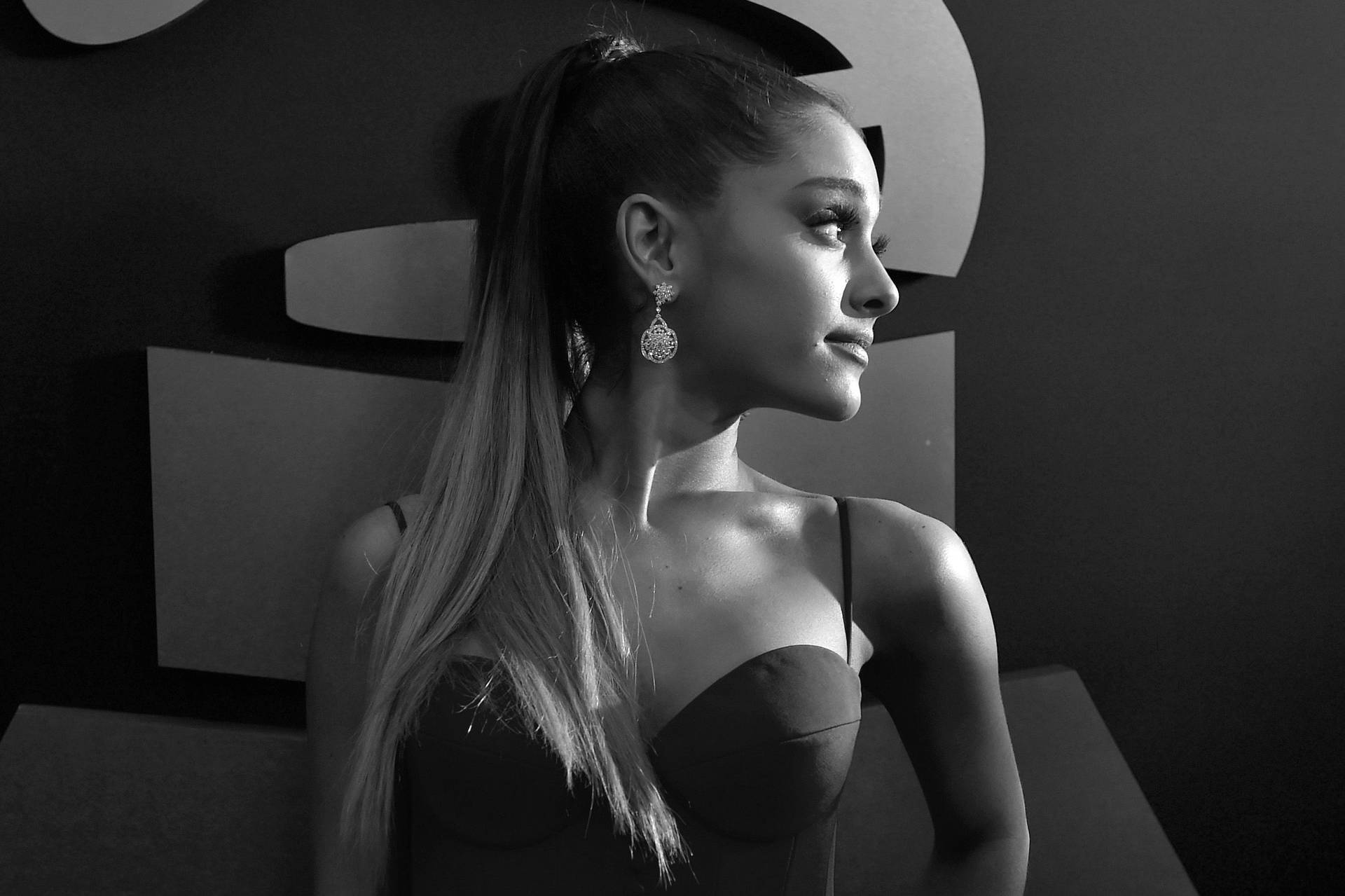 Ariana Grande Looking To The Side Background
