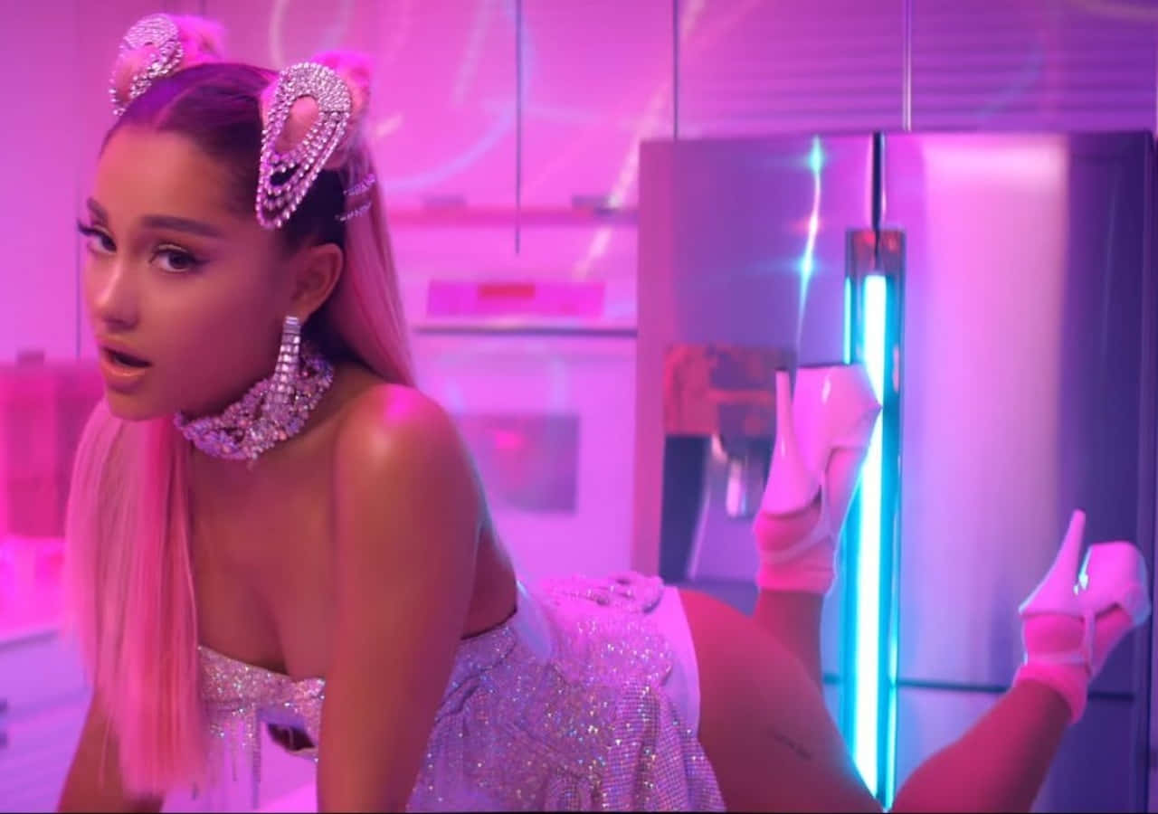 Ariana Grande Looks Fierce In Her Iconic 7 Rings Music Video Background