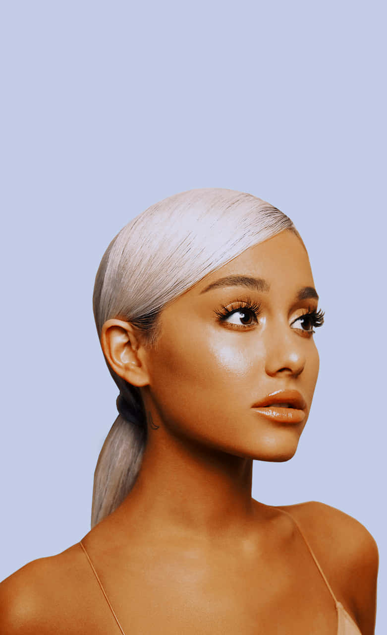 Ariana Grande Surrounded By A Bold Neon Aesthetic Background