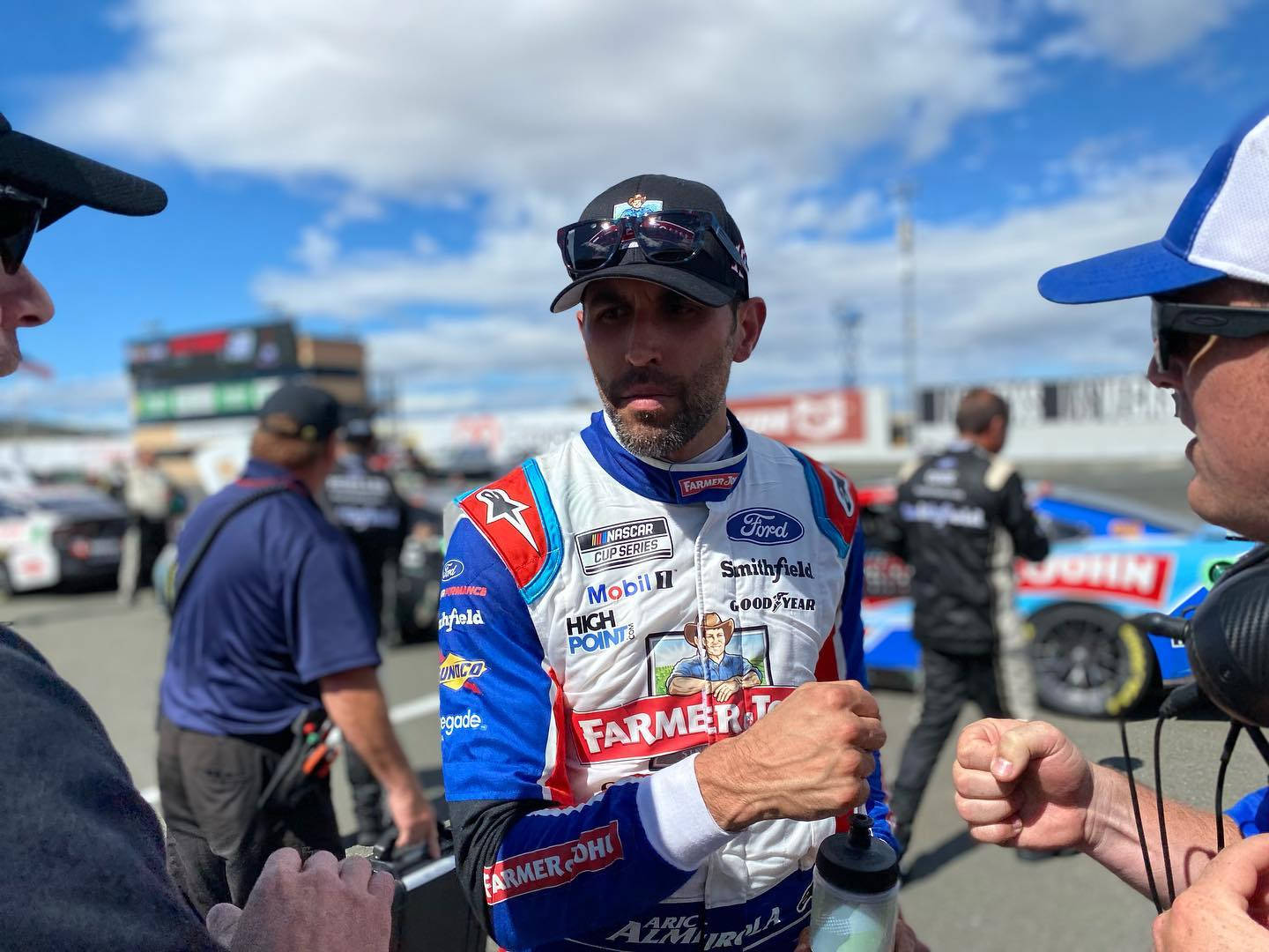 Aric Almirola Fist Bump Background