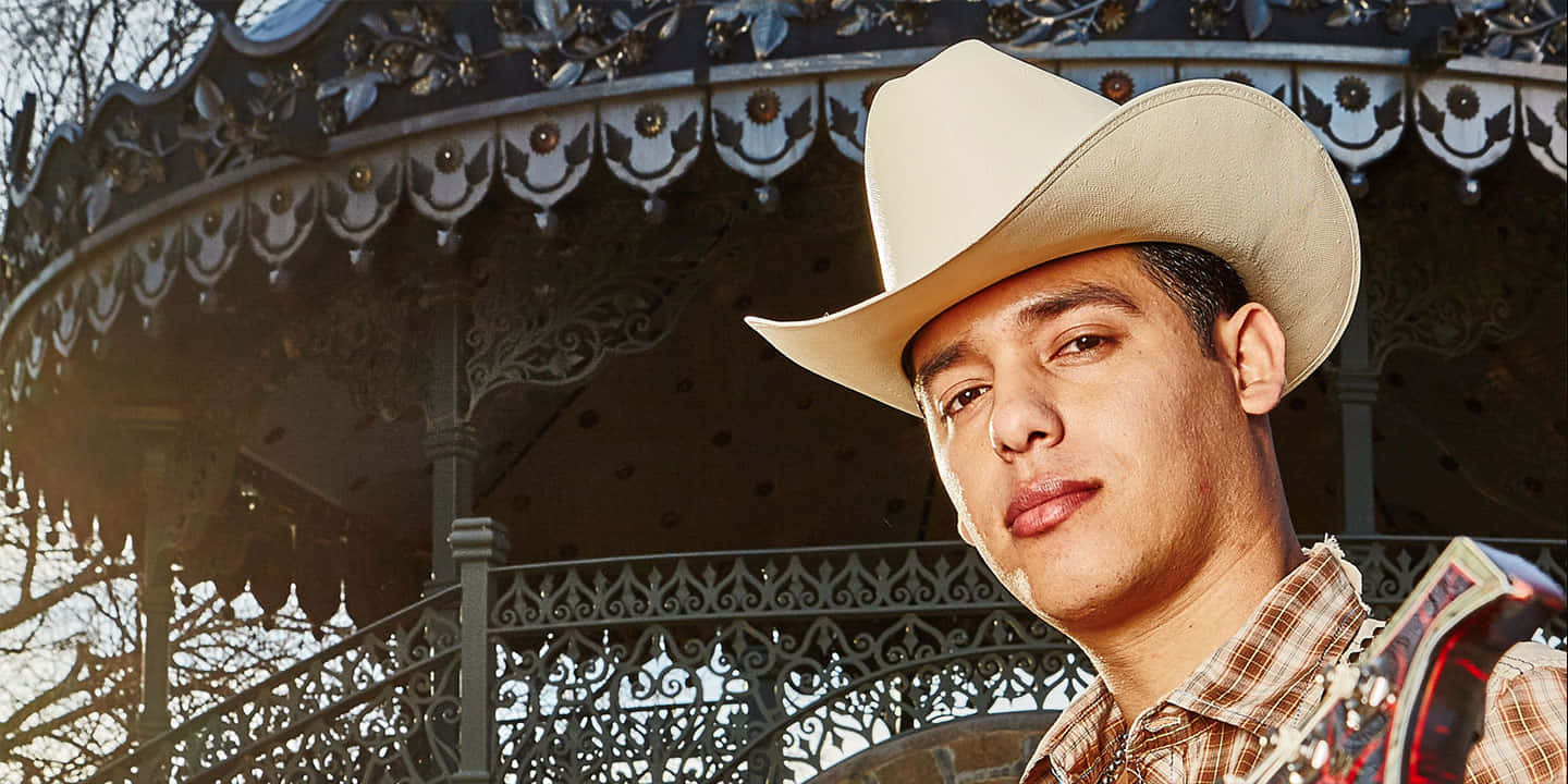 Ariel Camacho Of Los Plebes Del Rancho Performs In Mexico Background