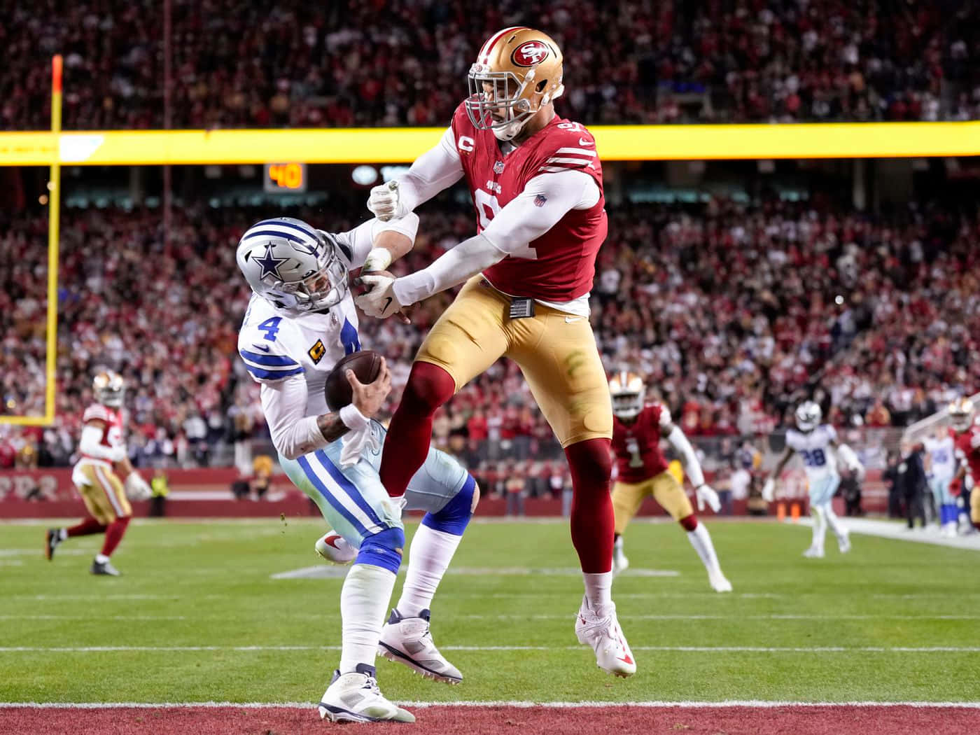 Arik Armstead And Dar Prescott Background