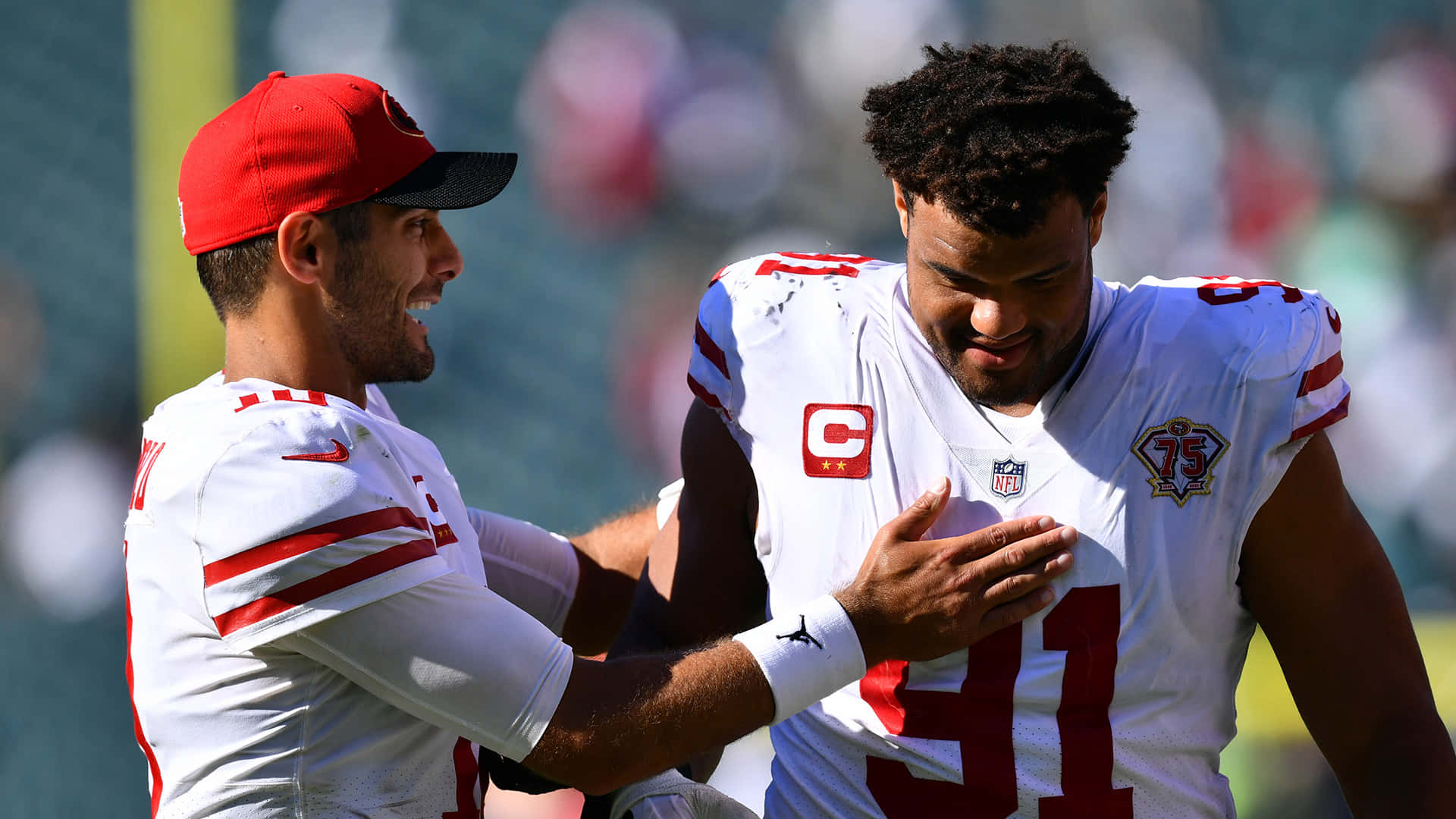 Arik Armstead With San Francisco 49ers Teammate Jimmy Garoppolo Background