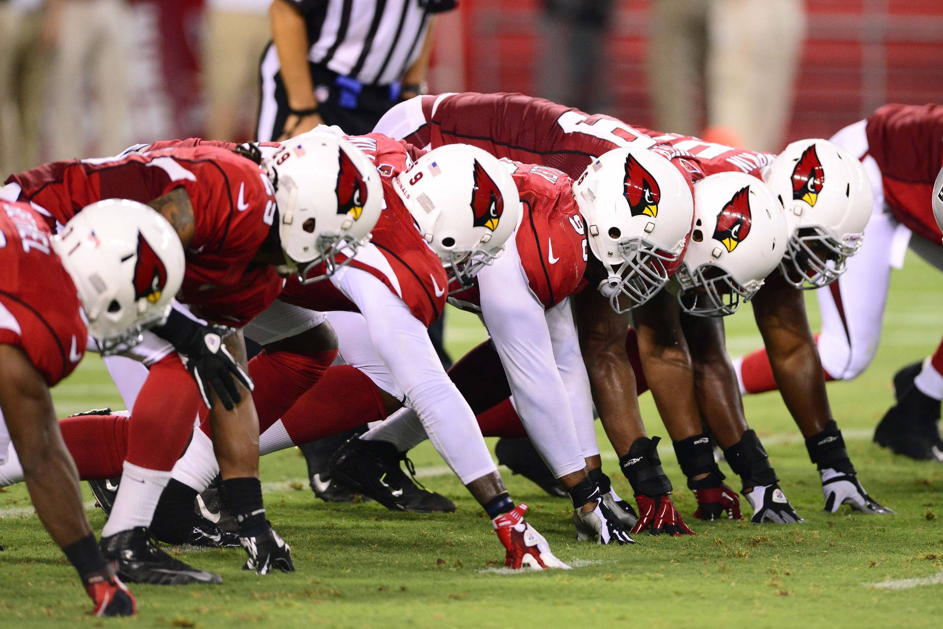 Arizona Cardinals Players On The Field Background
