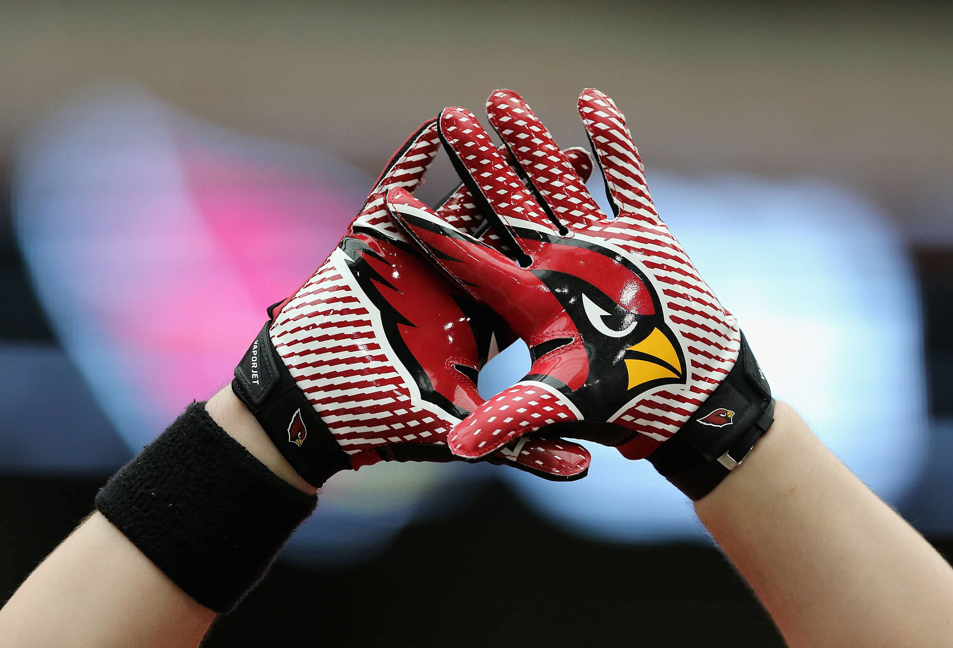 Arizona Cardinals Red Football Gloves Background