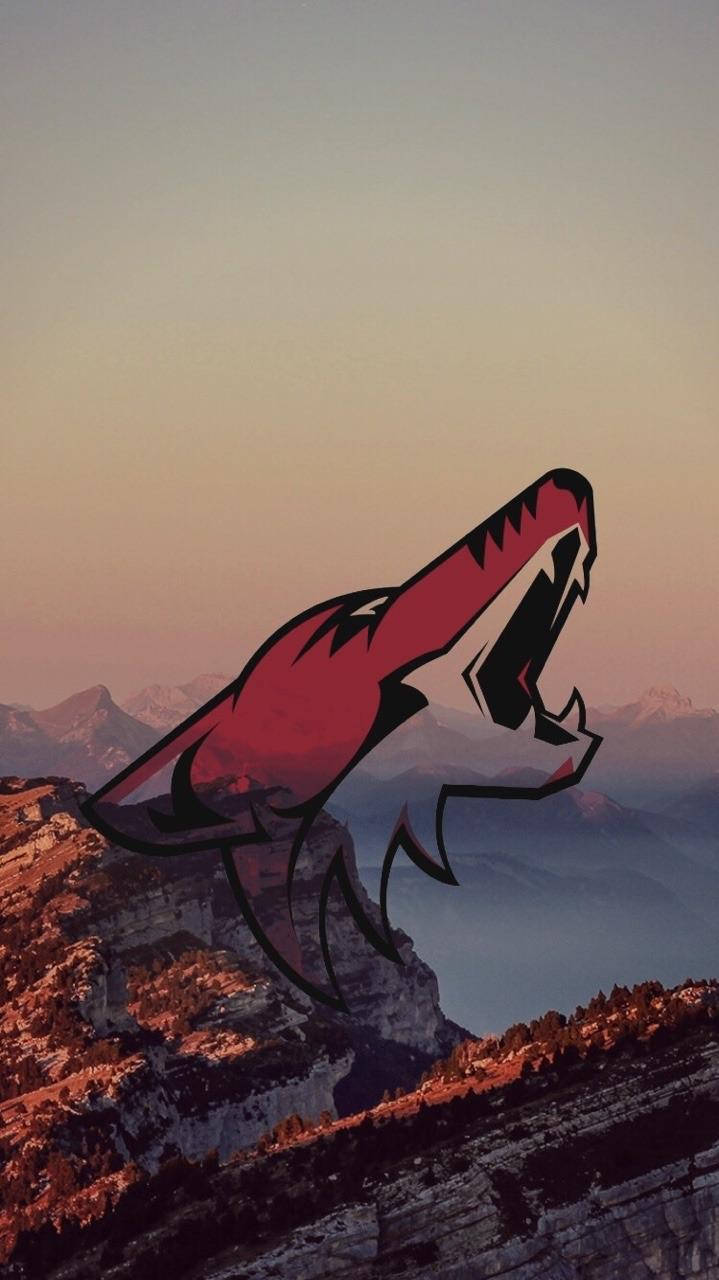 Arizona Coyotes Logo On Mountain Background