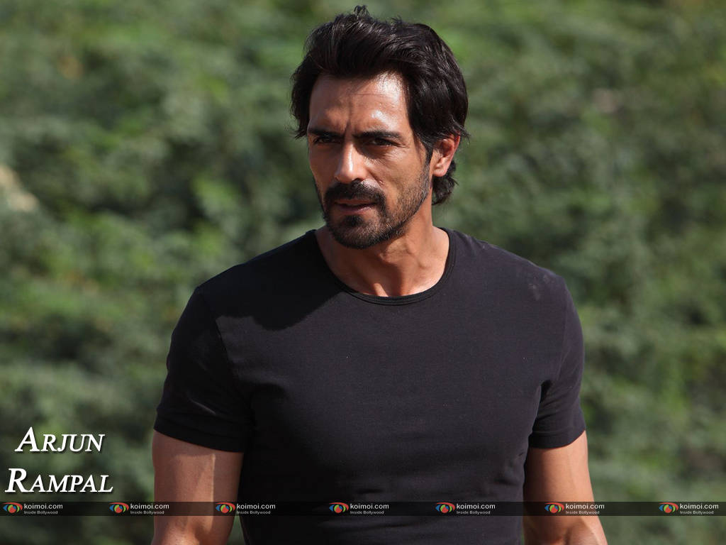Arjun Rampal Exuding Confidence In A Casual Portrait Background