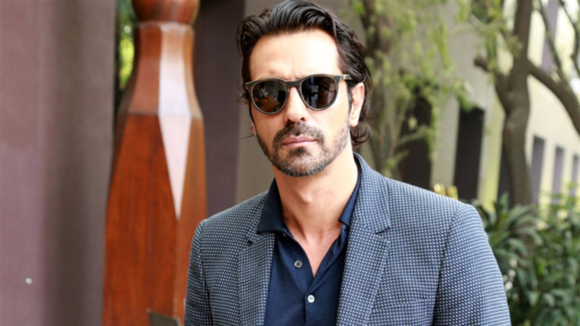 Arjun Rampal In Checkered Suit Background