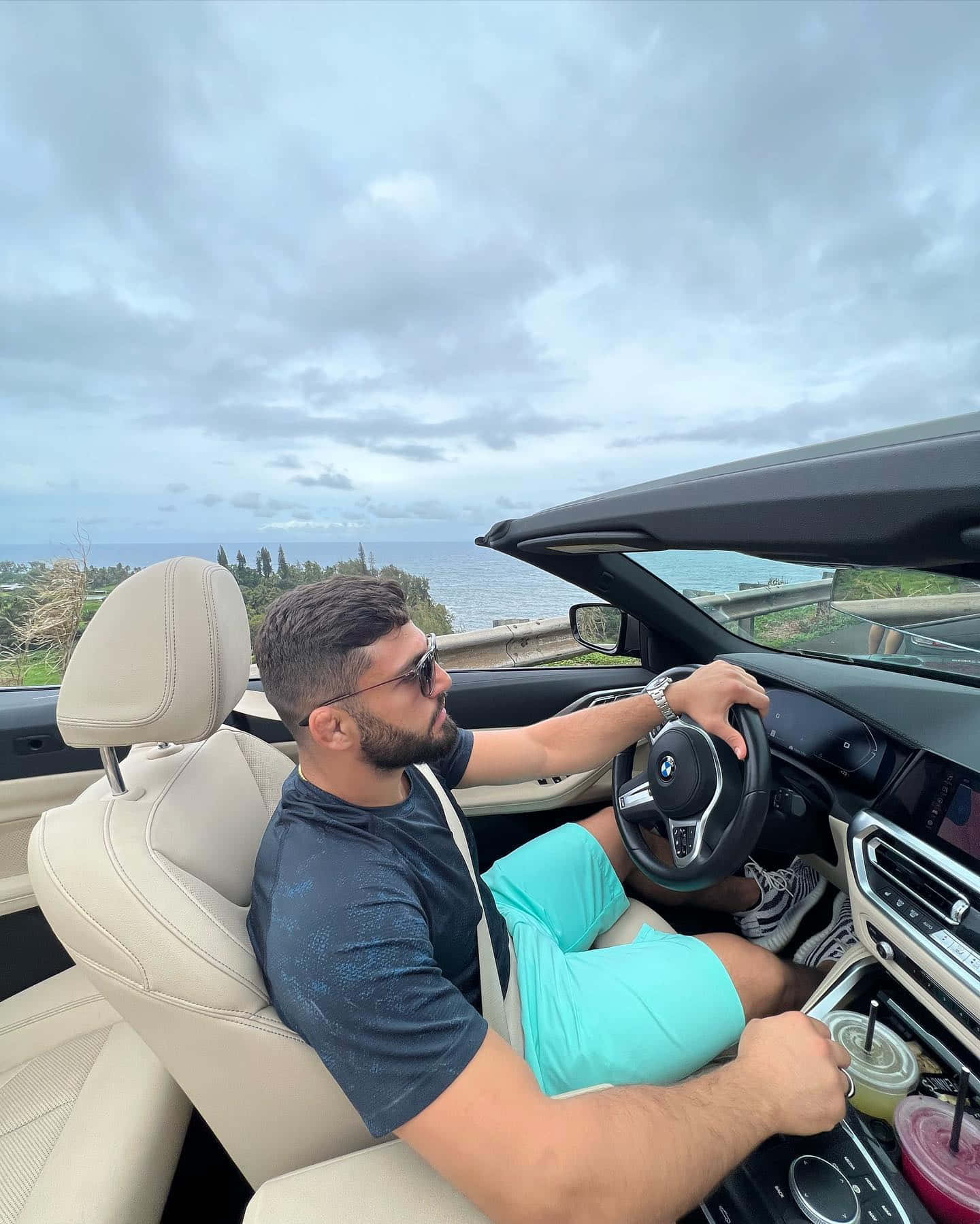 Arman Tsarukyan Driving A Convertible Background