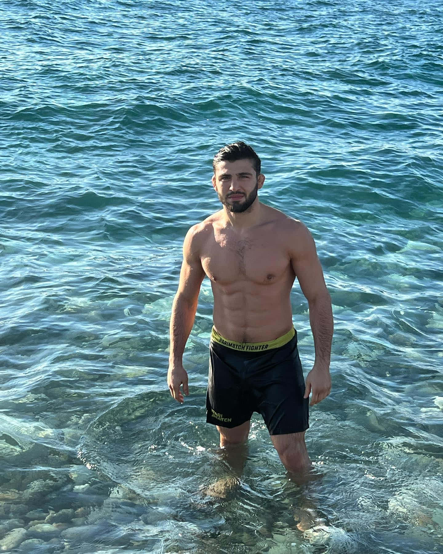 Arman Tsarukyan Feet In Ocean Background