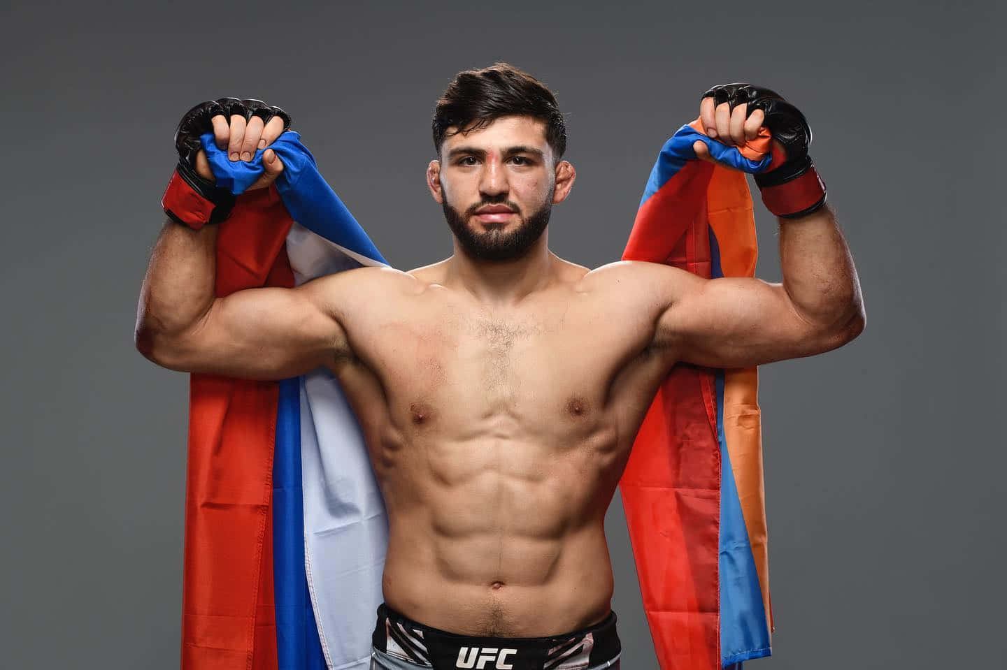 Arman Tsarukyan Muscle Pose With Flag Background