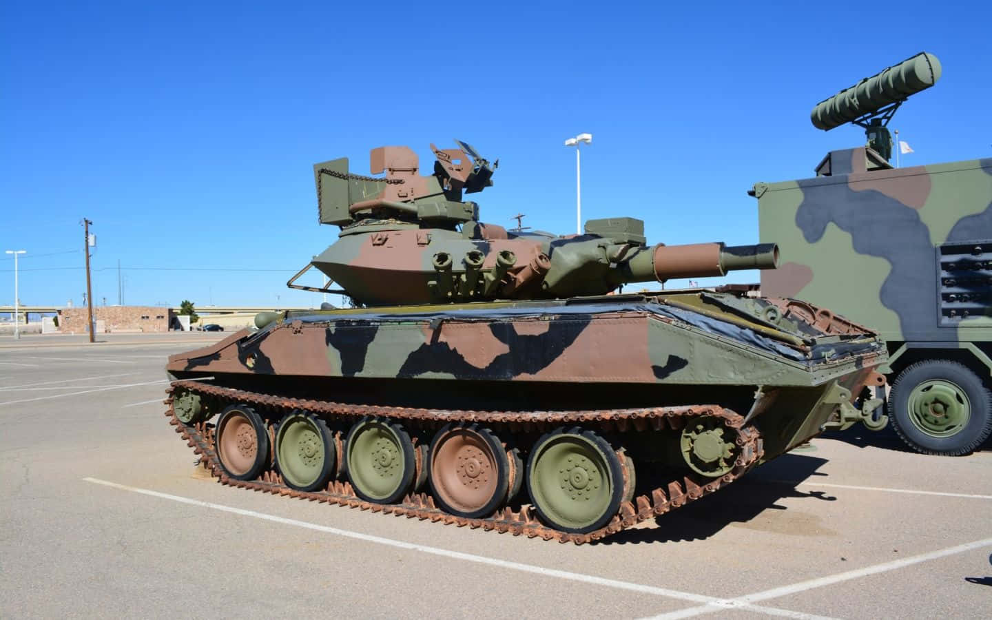 Armored Battle Tank At The Ready Background