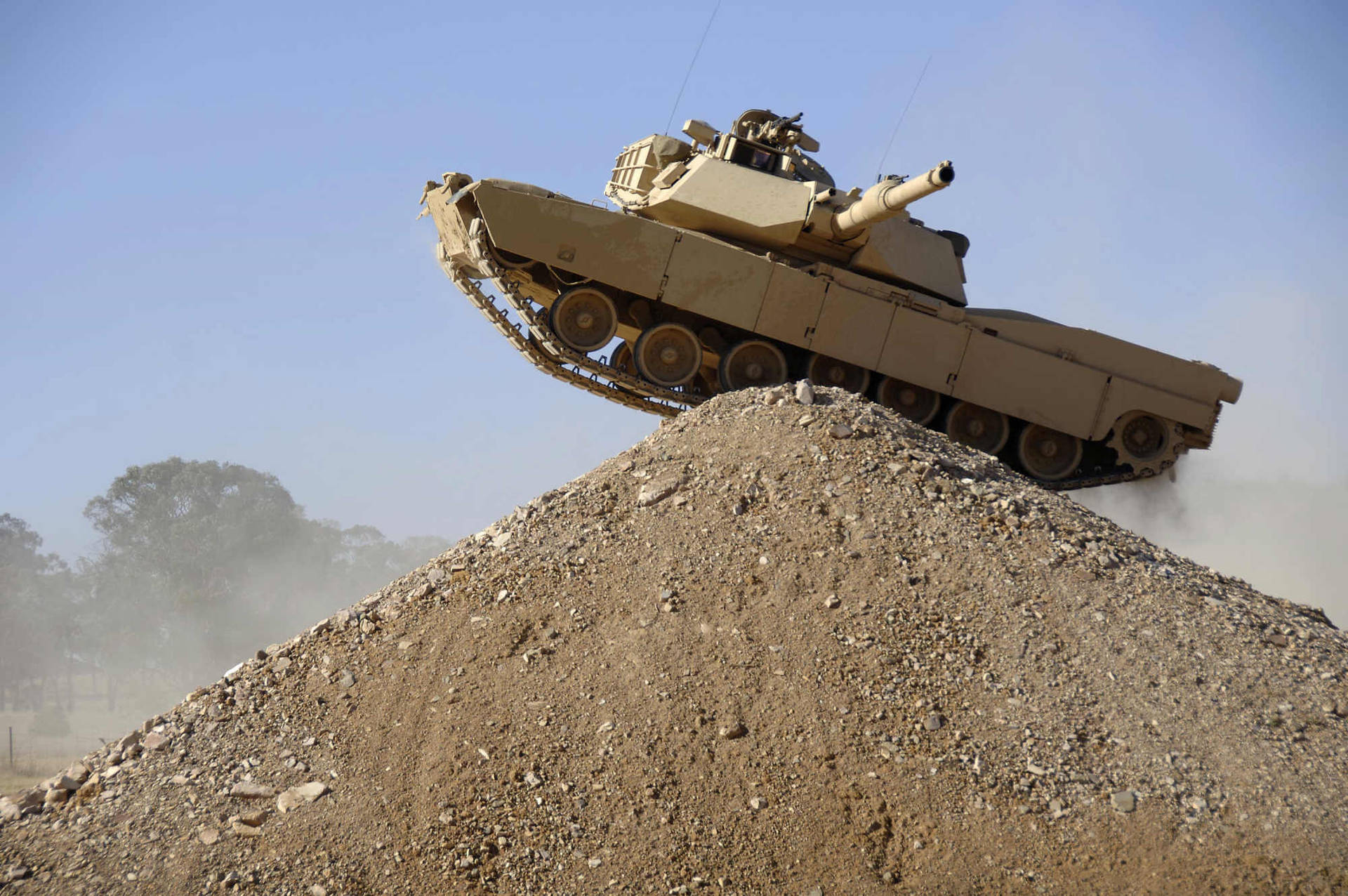 Army Tank On Sand Background