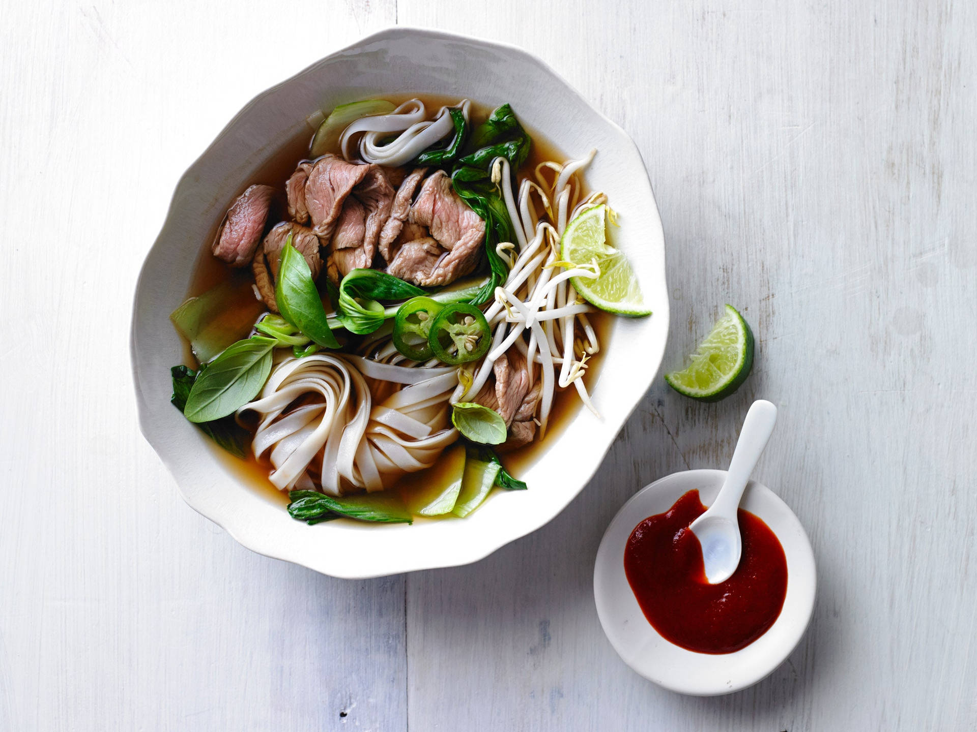 Aromatic Pho Noodle Soup With Spicy Chili Paste