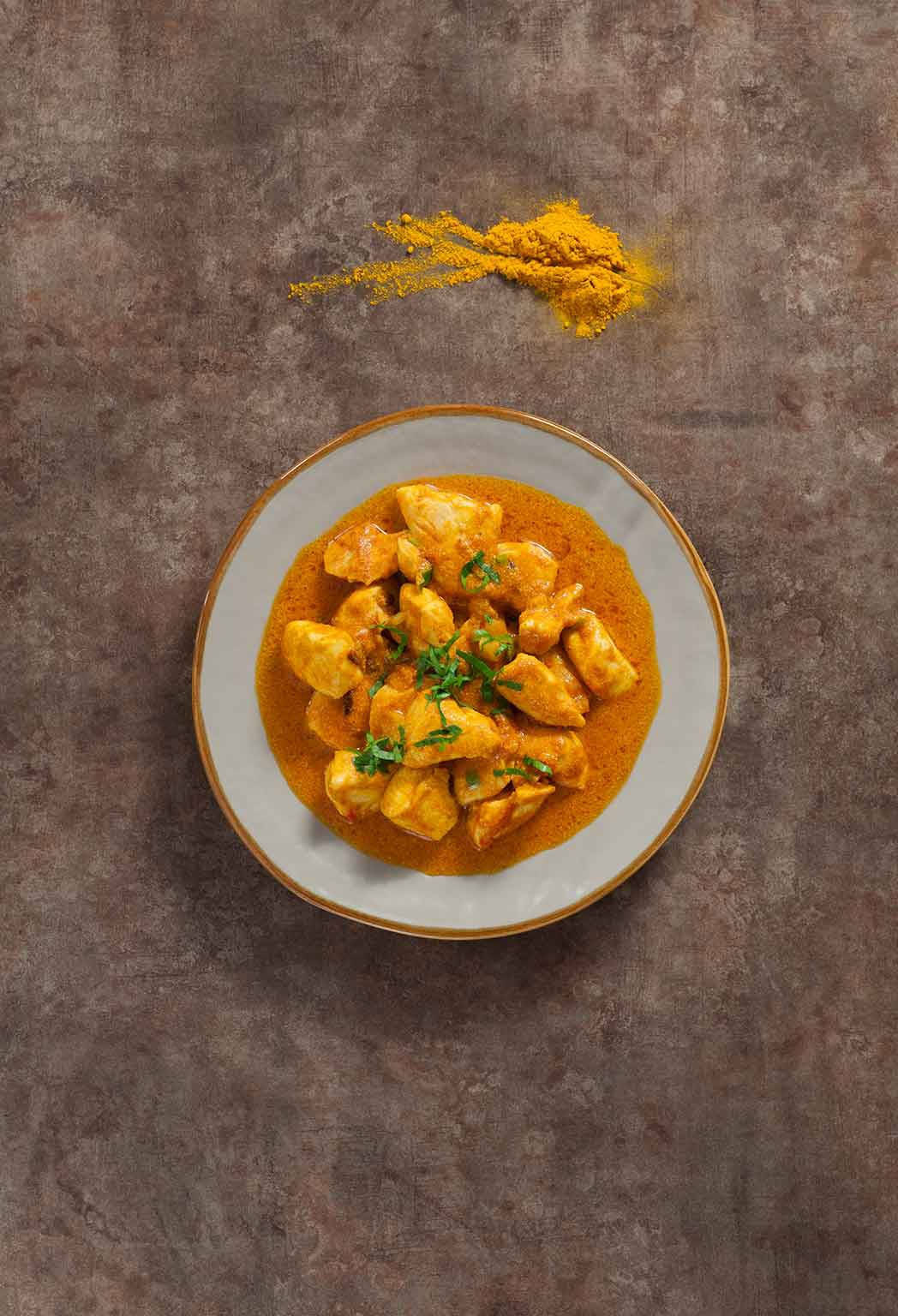 Aromatic Yellow Curry With Turmeric Powder Background