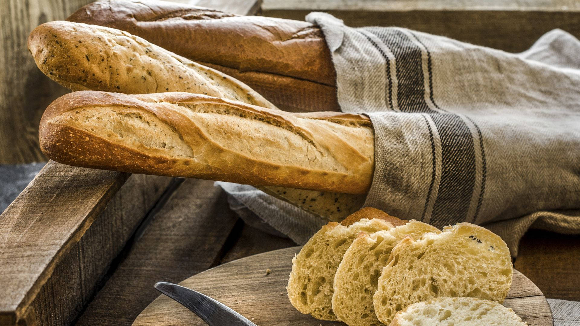 Array Of Freshly Baked Long Breads Background