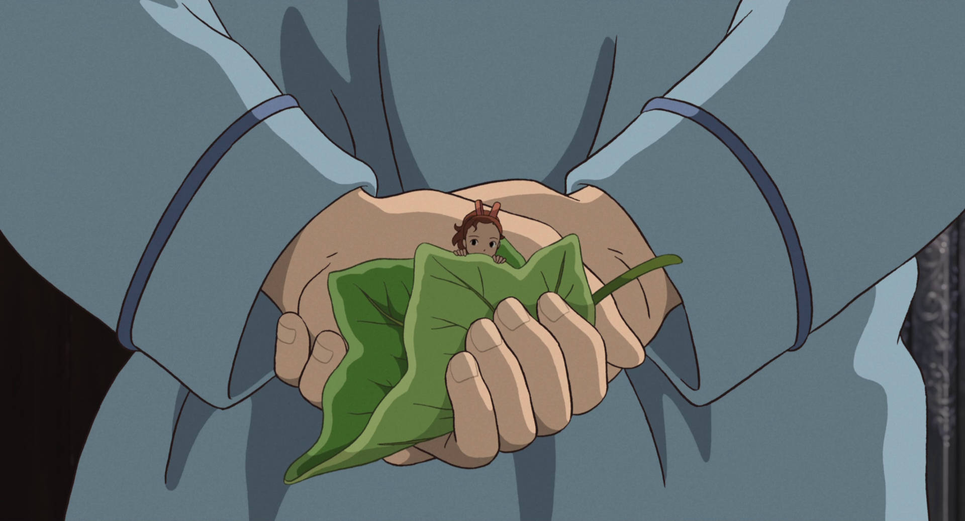 Arrietty In The Palm Of Sho's Hand Background