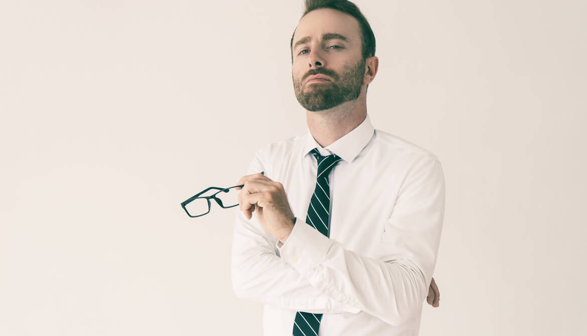 Arrogant Man Holding Eyeglasses Background