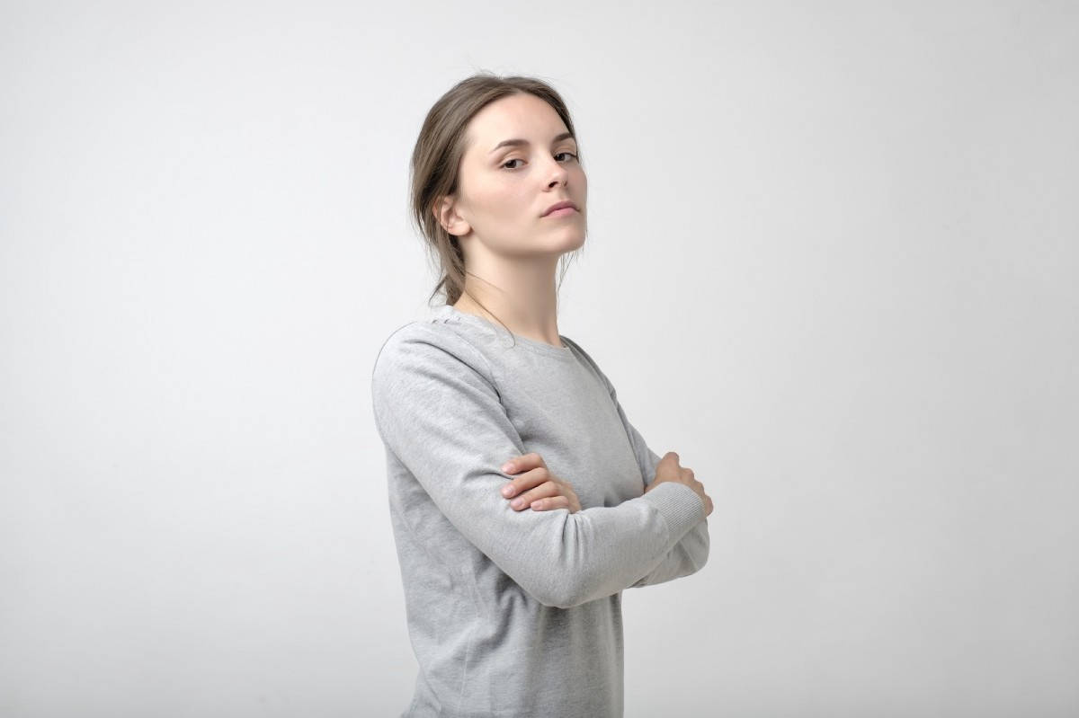 Arrogant Woman Against White Background Background