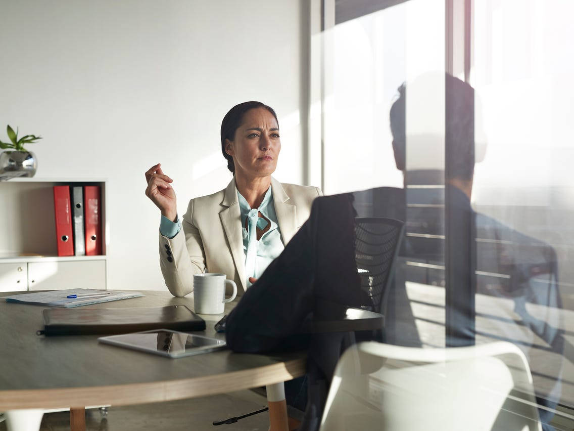 Arrogant Woman Listening To Colleague Background