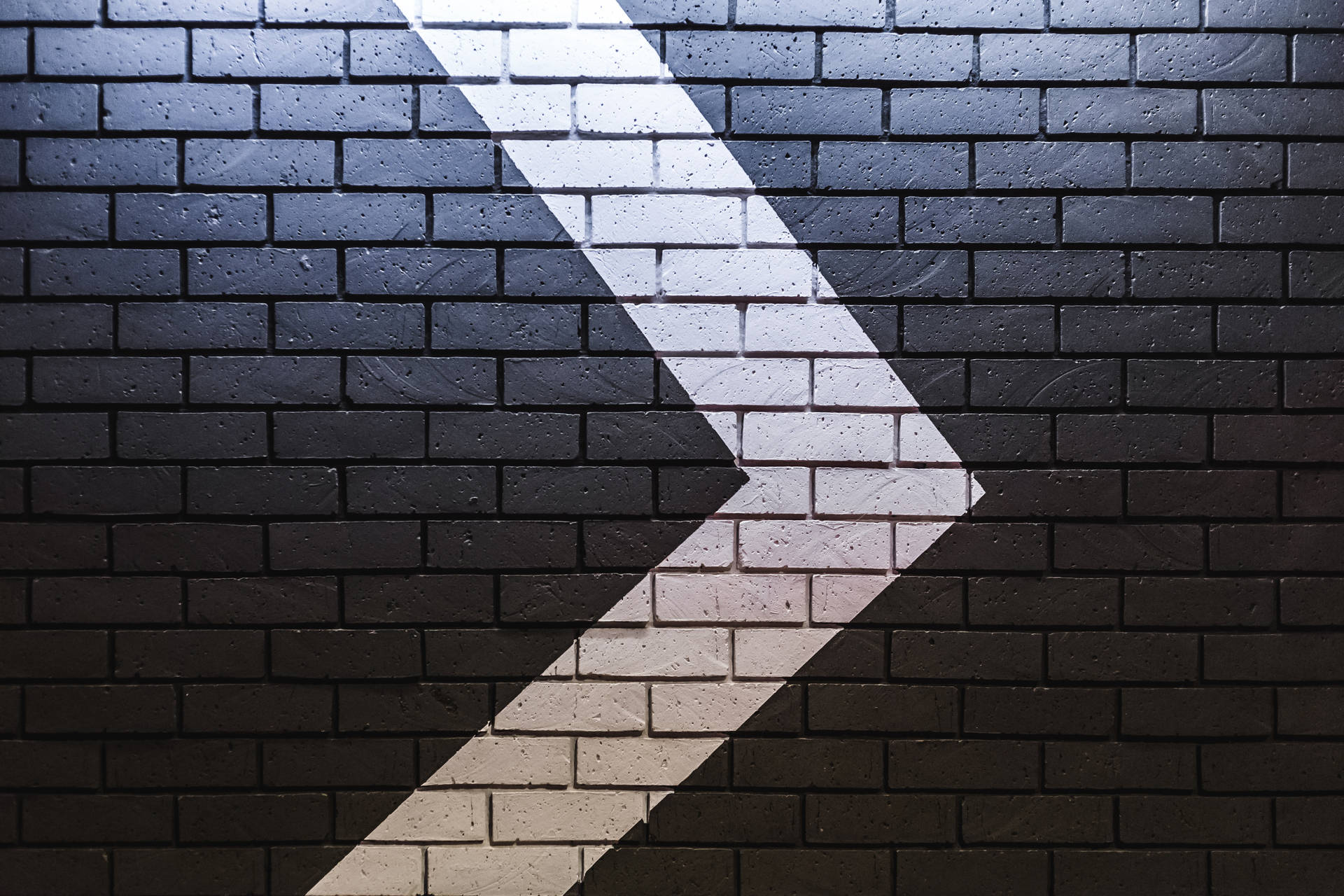 Arrow On Bricks Background