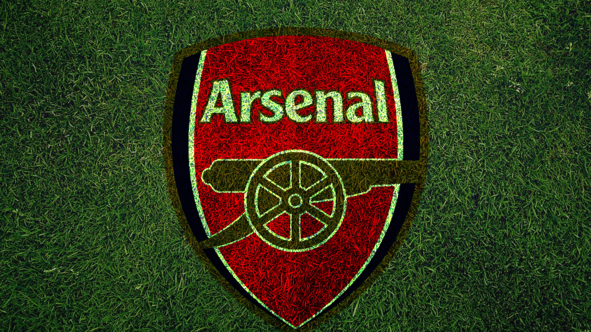 Arsenal Logo On Grass Field Background