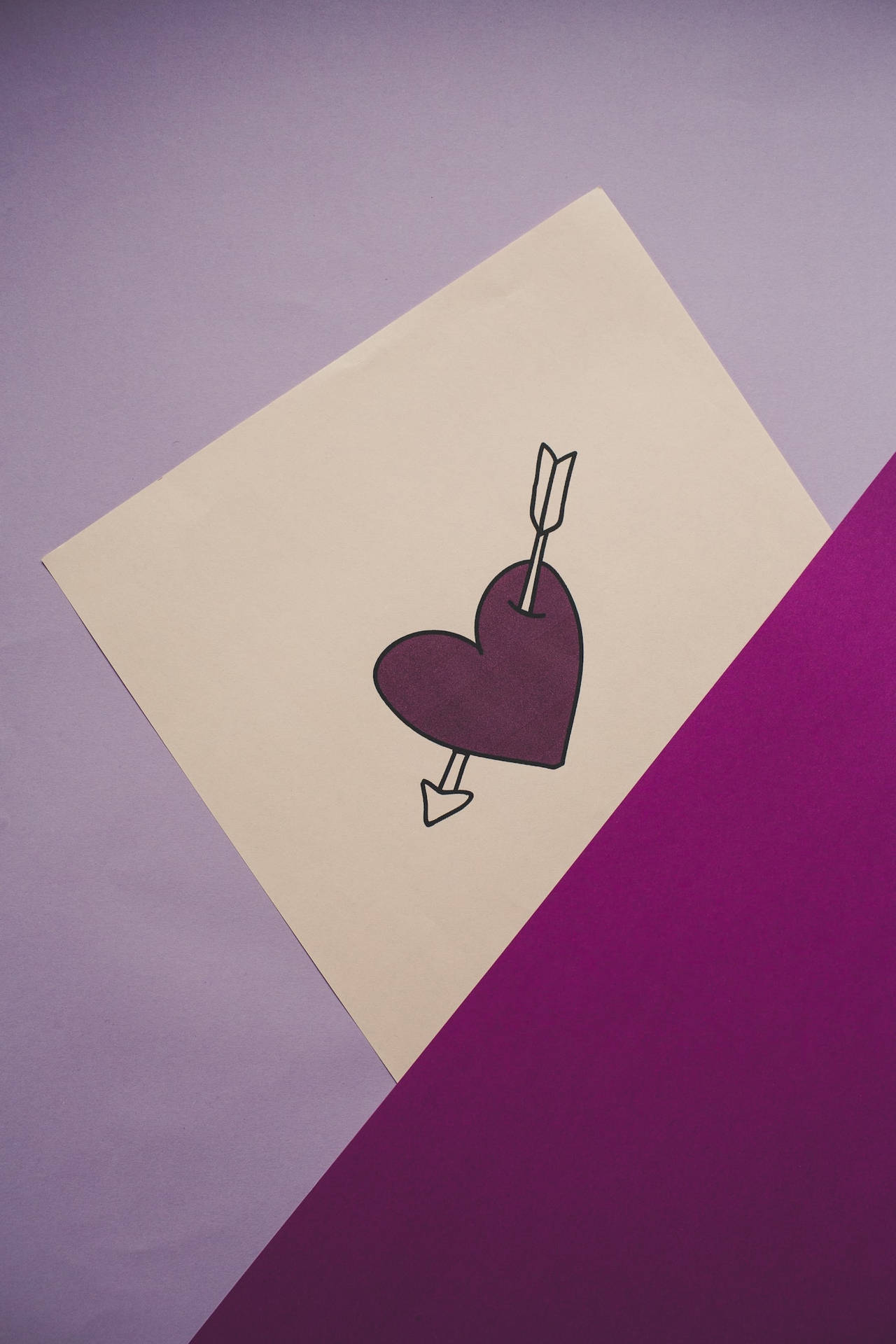 Art Drawing Of A Purple Heart With Arrow Background