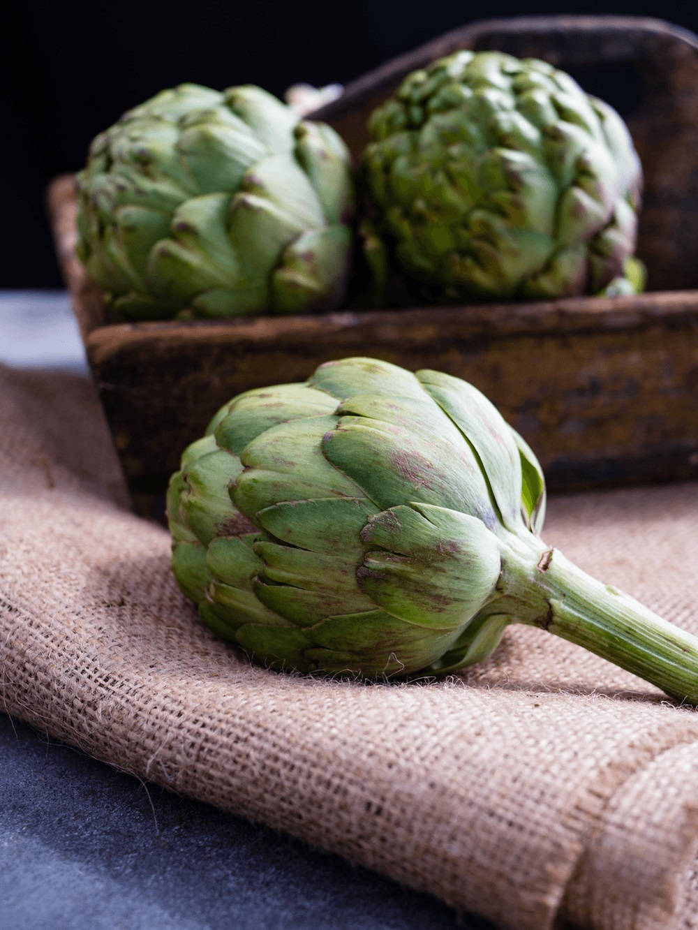 Artichoke Out Of A Wooden Box