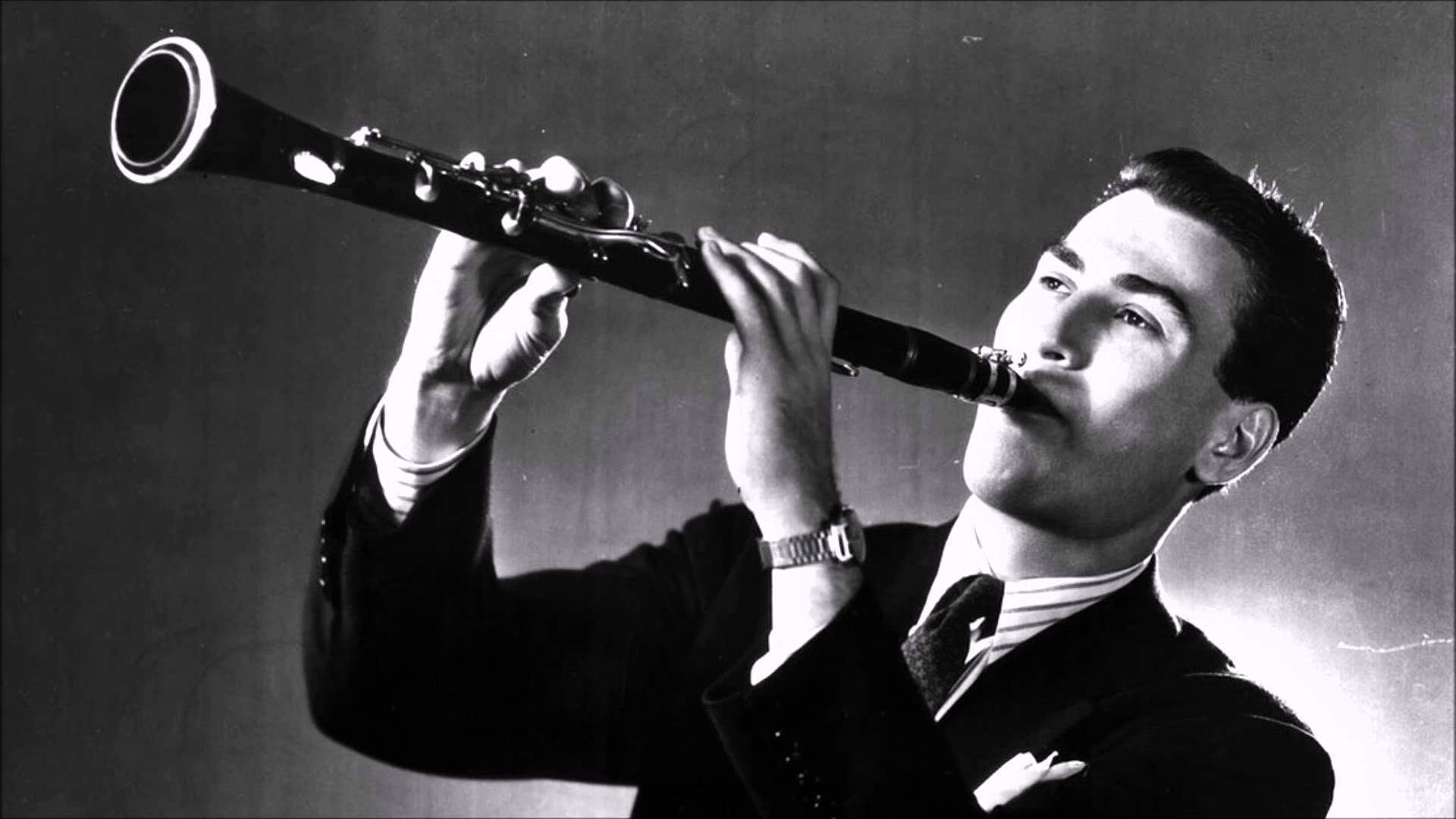 Artie Shaw In A Captivating Clarinet Performance Background