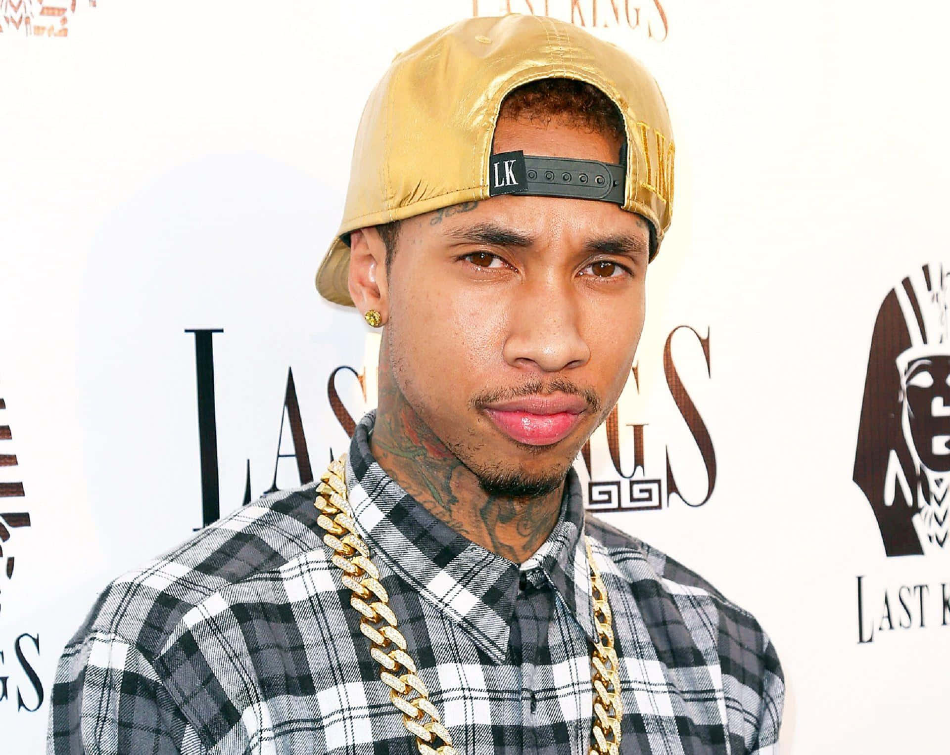 Artist Tyga Performing At Live Concert Background