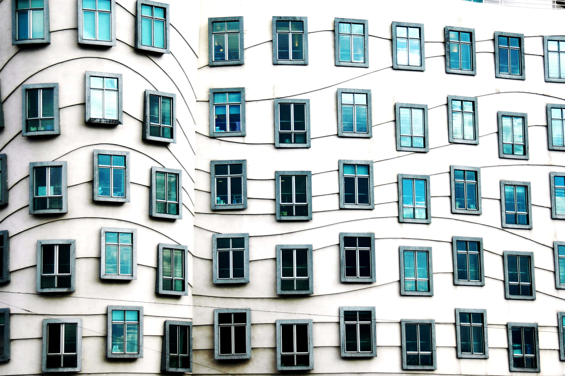 Artistic Contrast Of Dancing House’s Architecture Background