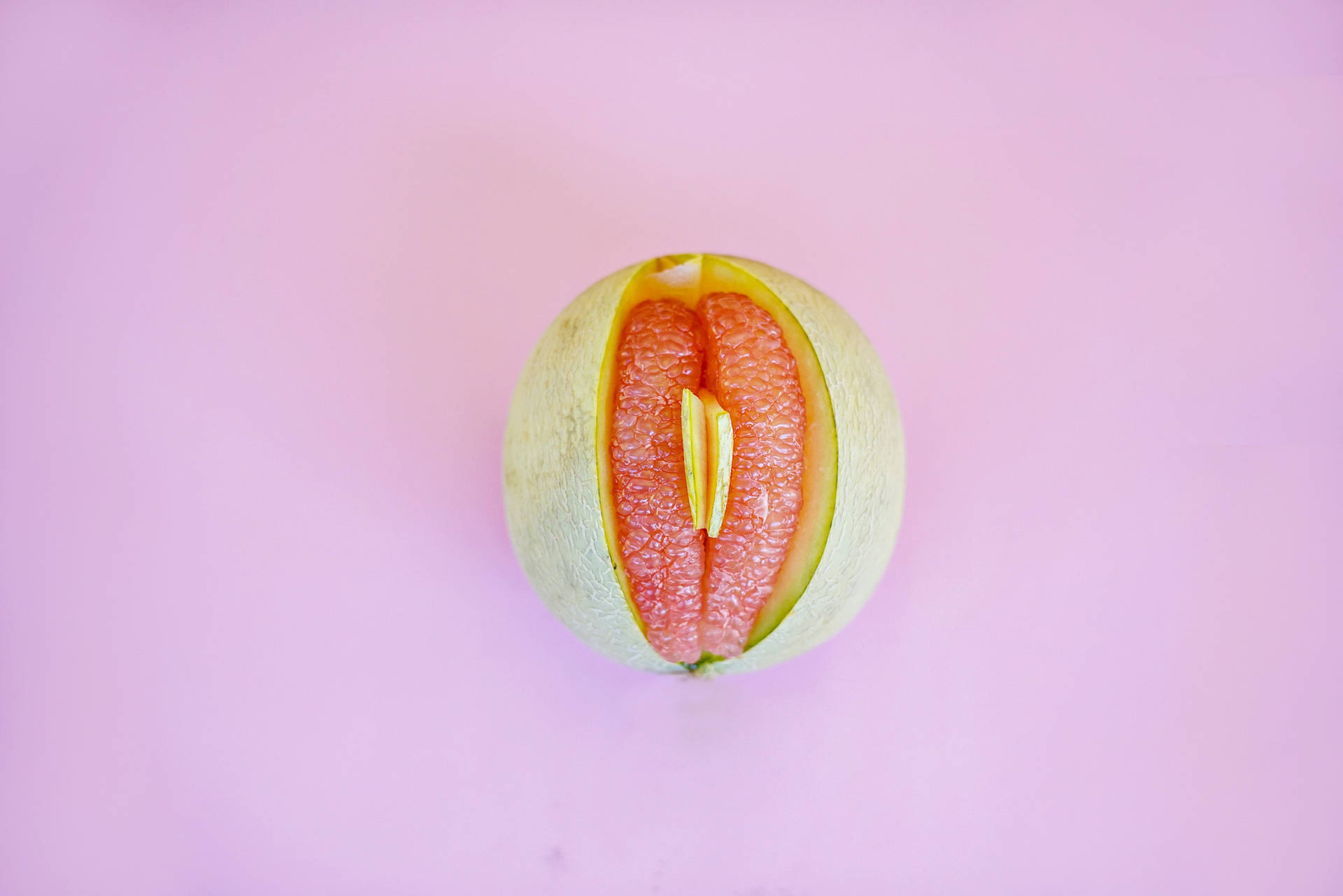 Artistic Representation Of Sexual Symbol Using Pomelo Fruit Background