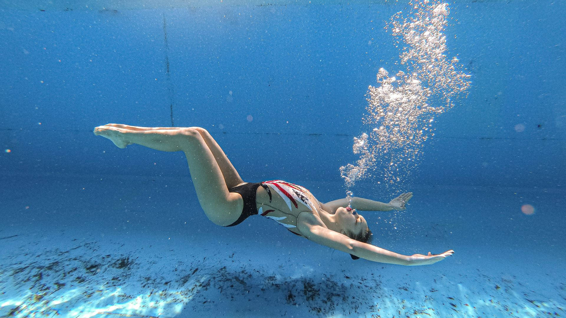 Artistic Swimmer Sinking Down Background