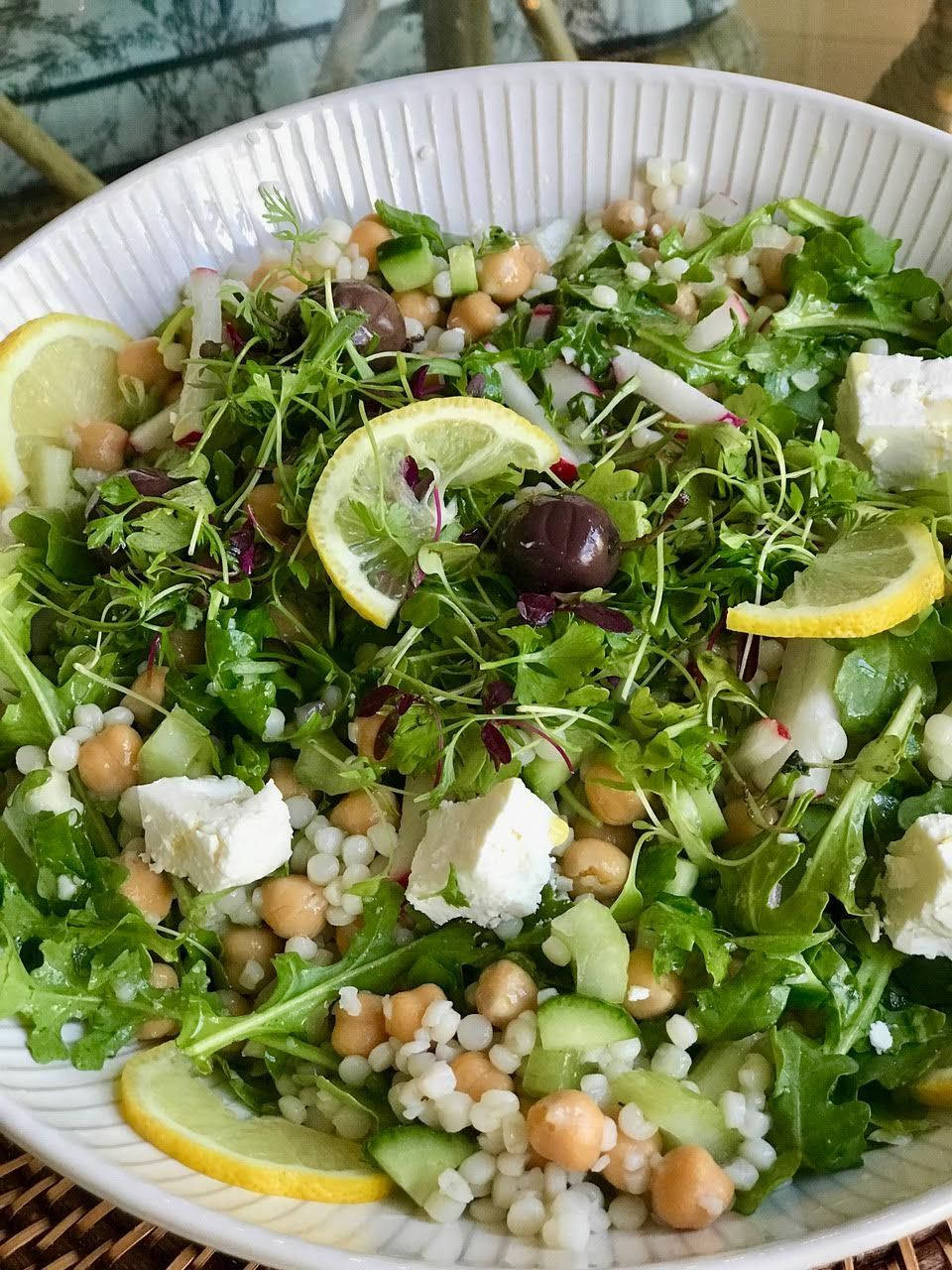 Arugula Leaves, Cucumber, Peas, And Lemons