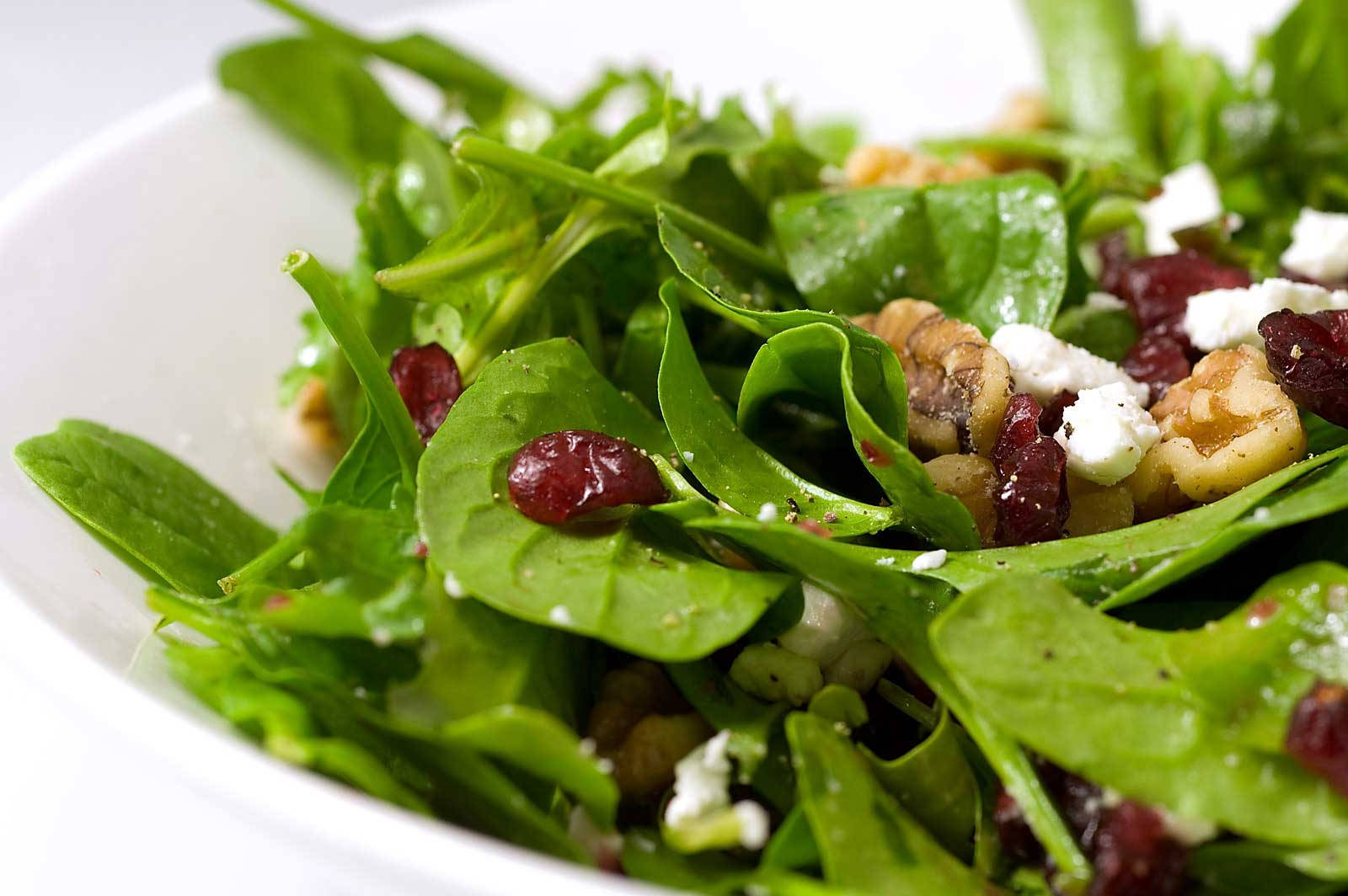 Arugula Leaves, Pomegranates, And Walnuts