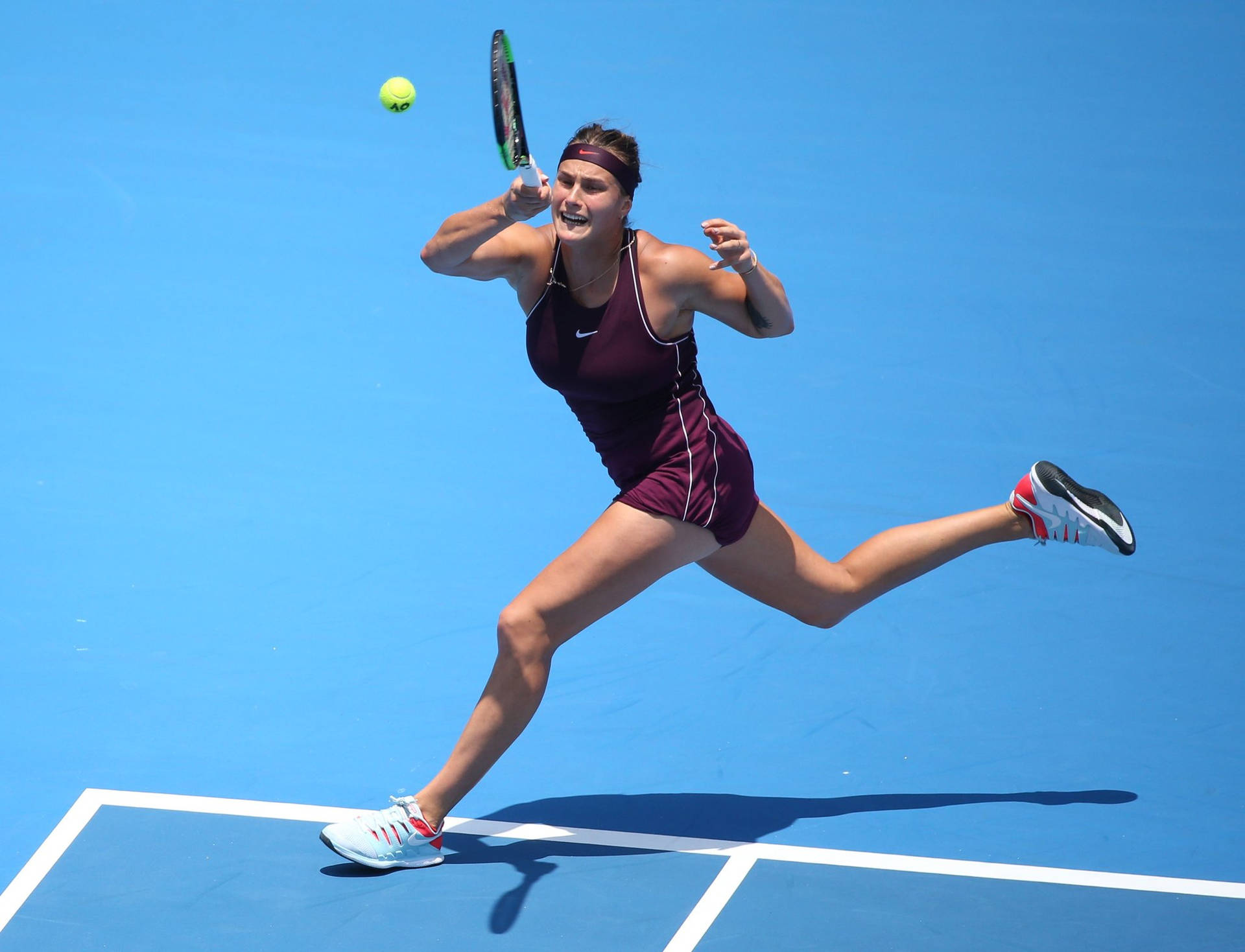 Aryna Sabalenka Giving Her All In A Tennis Match. Background