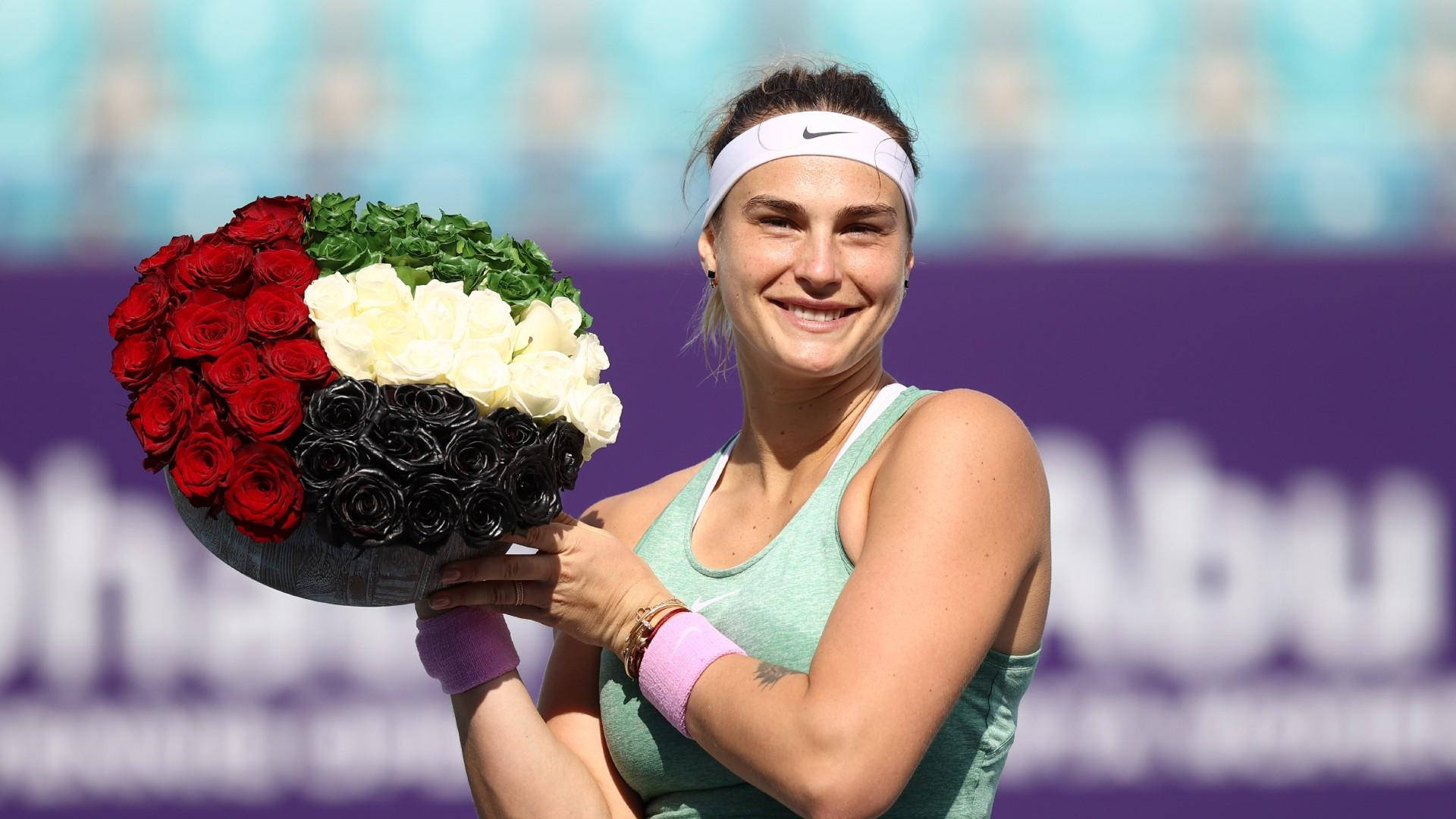 Aryna Sabalenka Holding Flowers Background