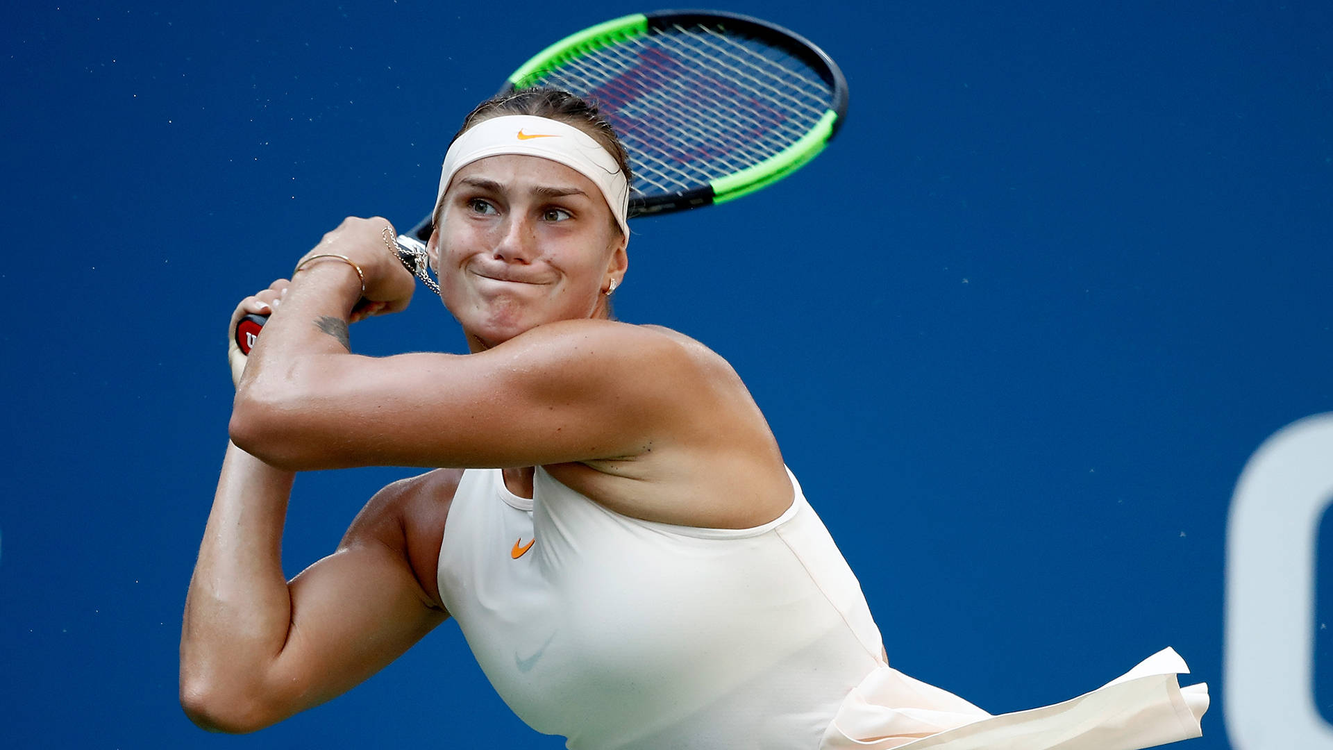 Aryna Sabalenka In Action - Tennis Power Shot Background