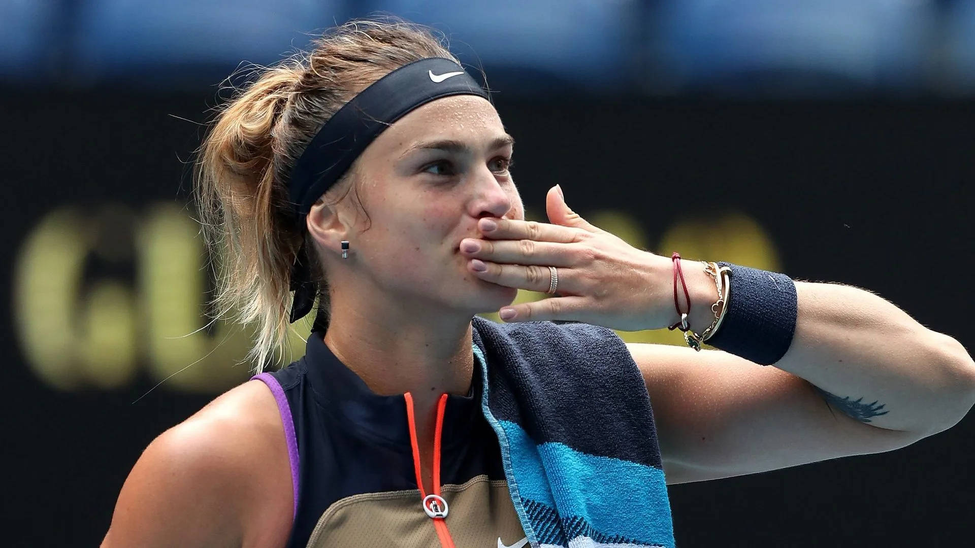 Aryna Sabalenka's Celebratory Kiss To Her Hand Background