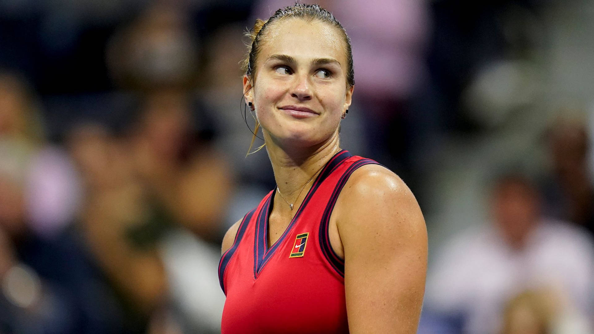 Aryna Sabalenka Smiling At The Audience Background