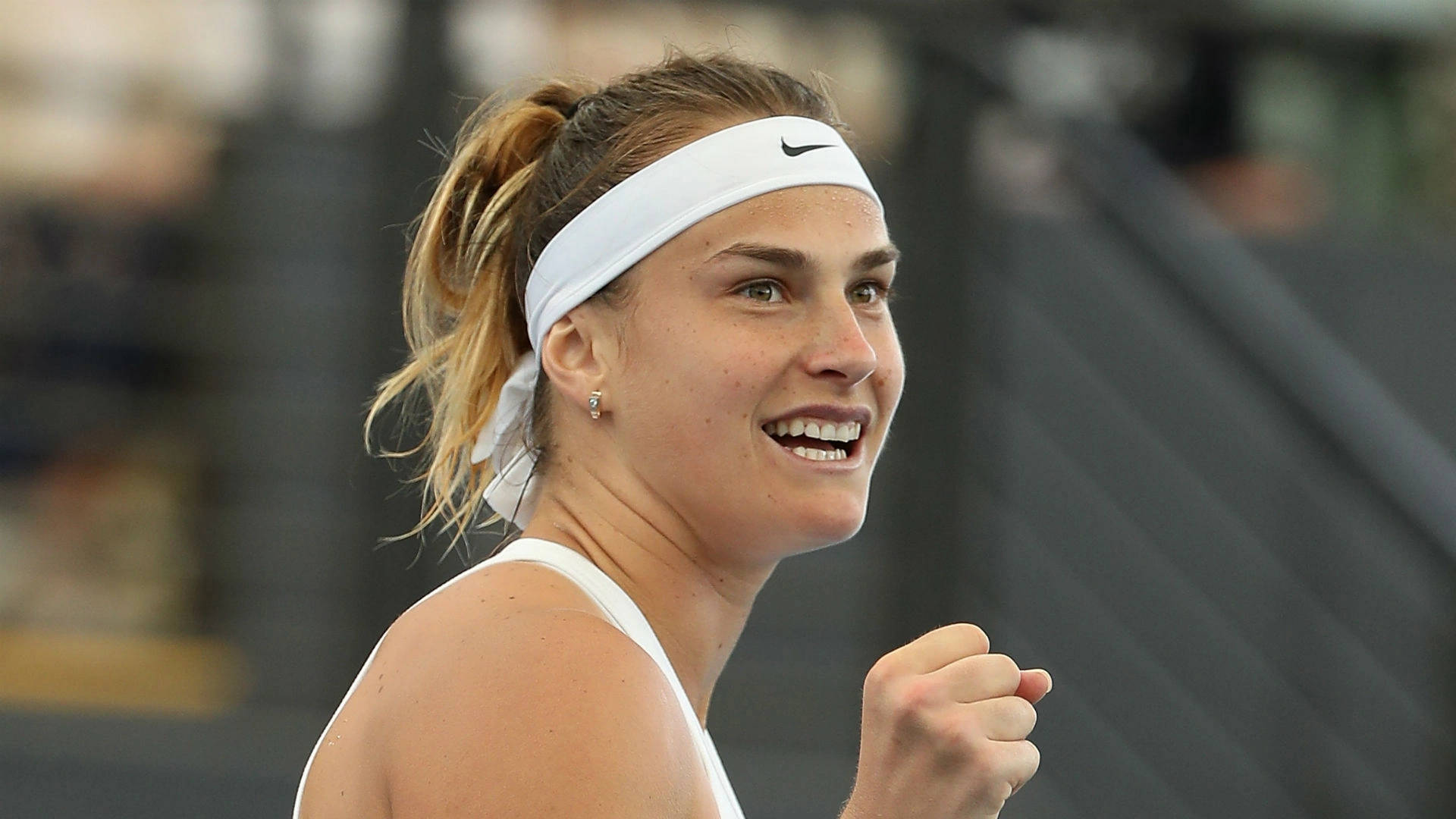 Aryna Sabalenka Wearing White Headband Background