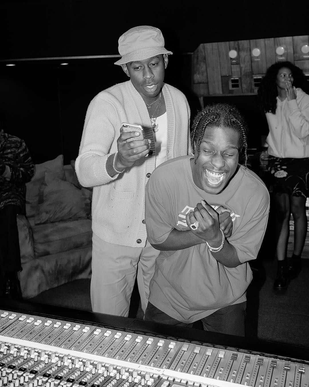 Asap Rocky And Tyler The Creator Spark Joy With A Joyful Smile Background