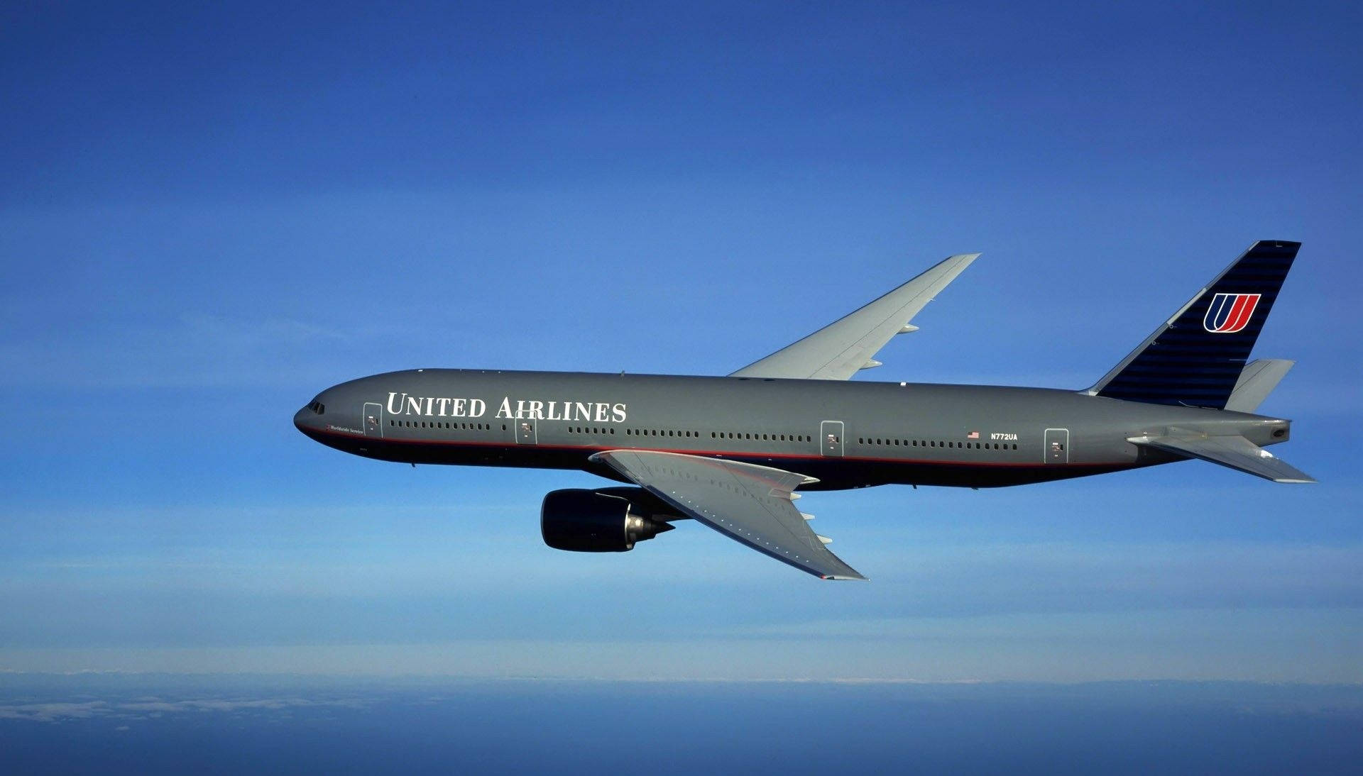 Ascending Black United Airlines Plane Background