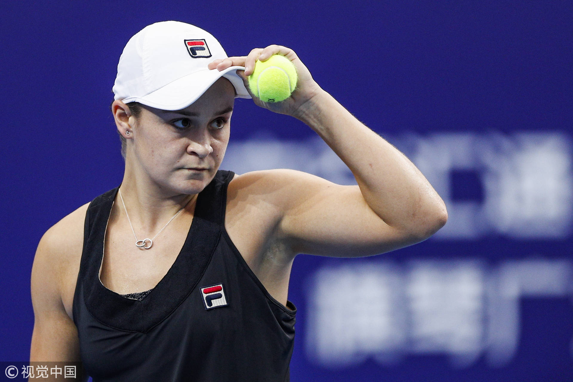 Ashleigh Barty Fixing Her Cap Background