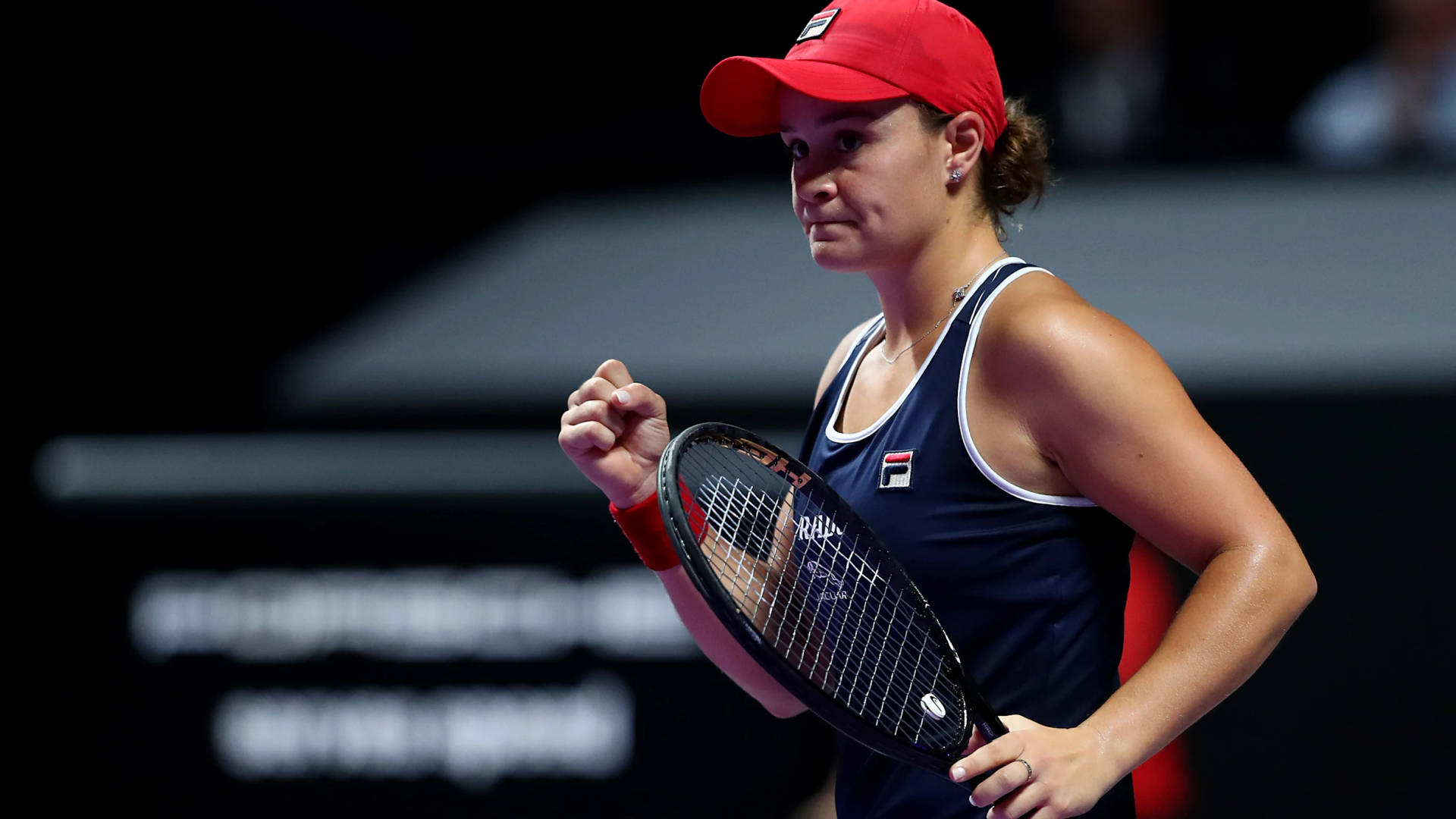 Ashleigh Barty Focusing During A Game Background