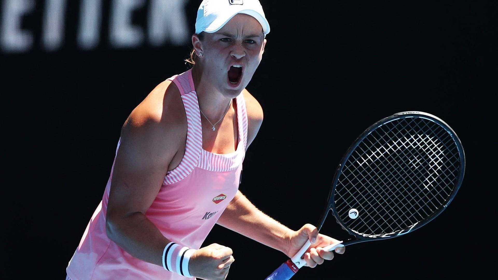 Ashleigh Barty In Intense Tennis Match Background