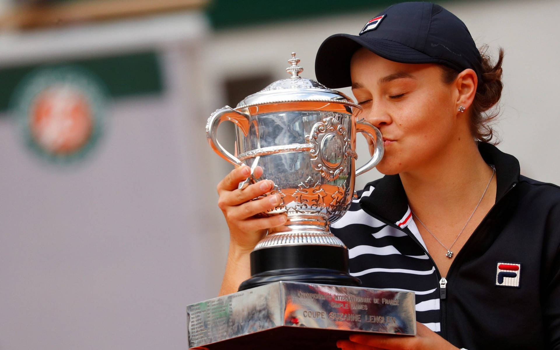 Ashleigh Barty Kissing Her Trophy Background