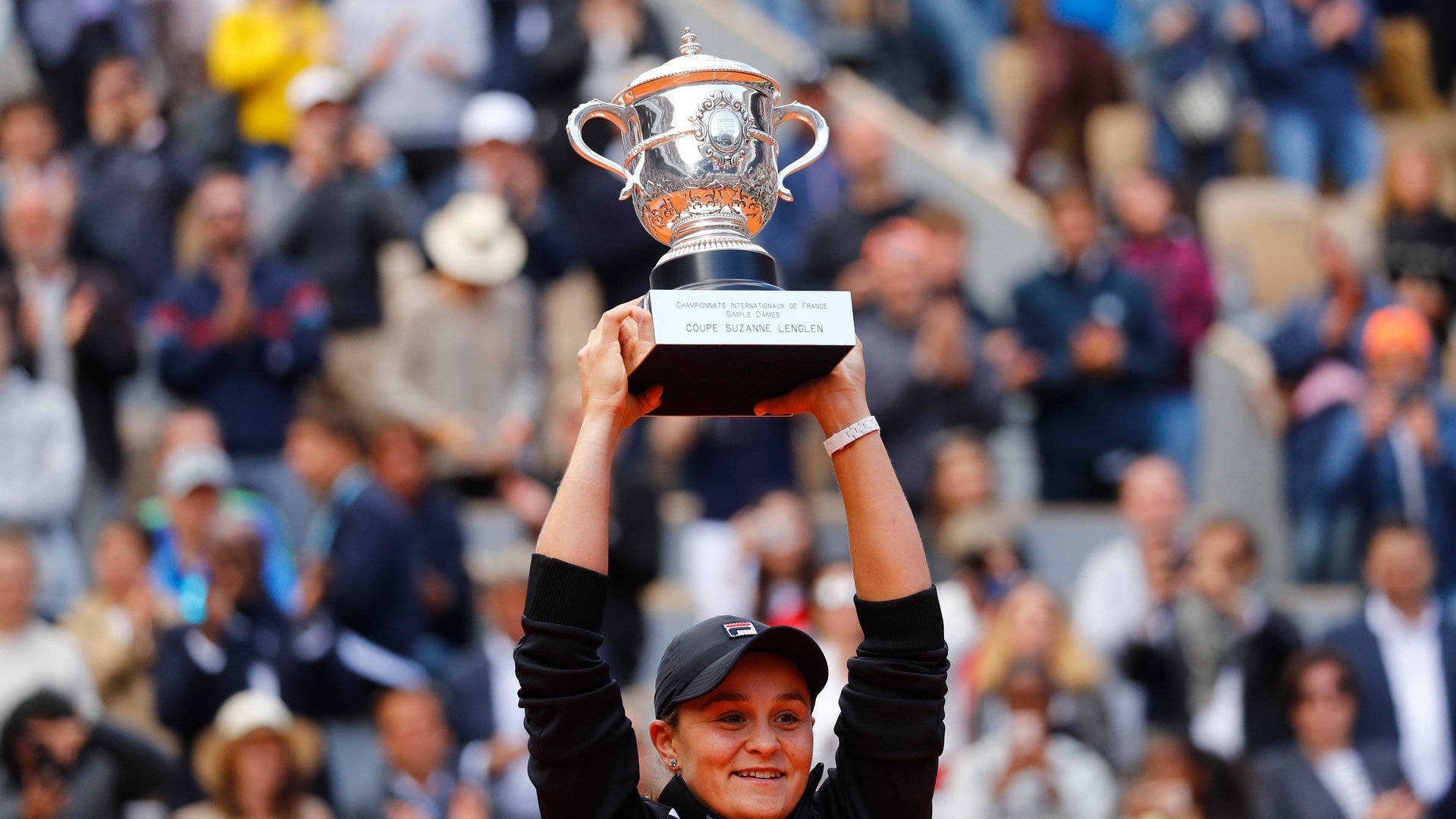 Ashleigh Barty Raising Her Trophy Background