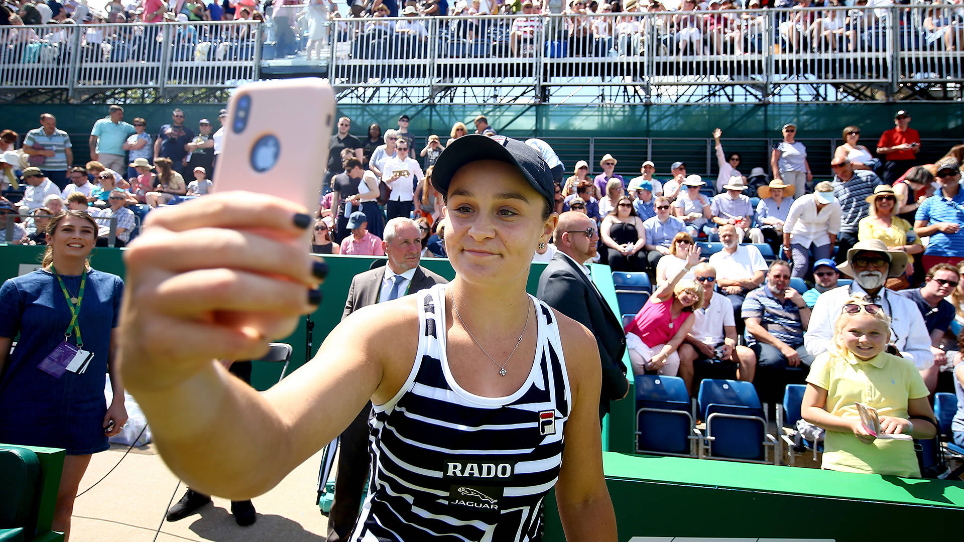 Ashleigh Barty Taking Selfie With Fans Background